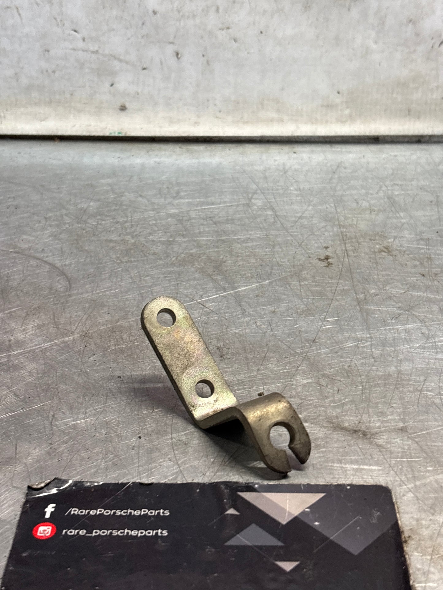 Porsche 924 LHD exhaust manifold bracket, used 047133239