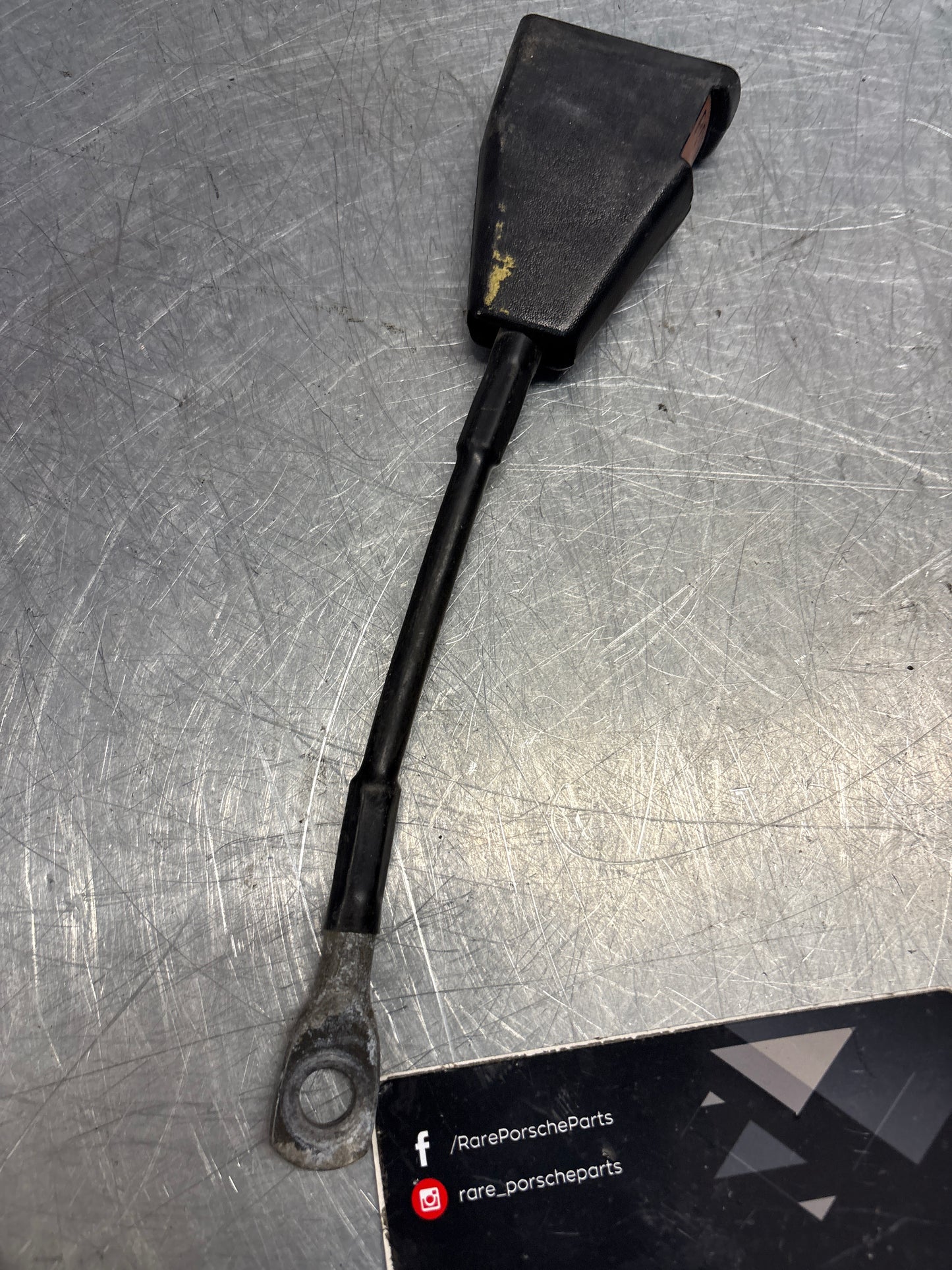 Used Porsche 924 early right seat belt anchor clasp retainer, buckle. 477857756D used
