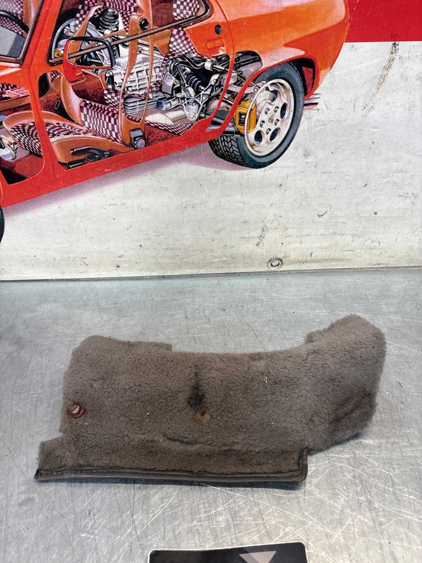 Porsche 928 S4 rear left carpet trim cover, used grey 92855109102