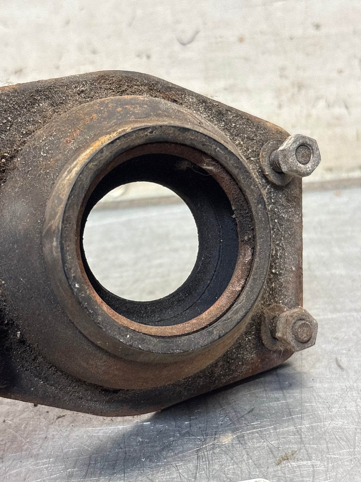 Porsche 924 / 944 front suspension bearing flange, 477412345, used