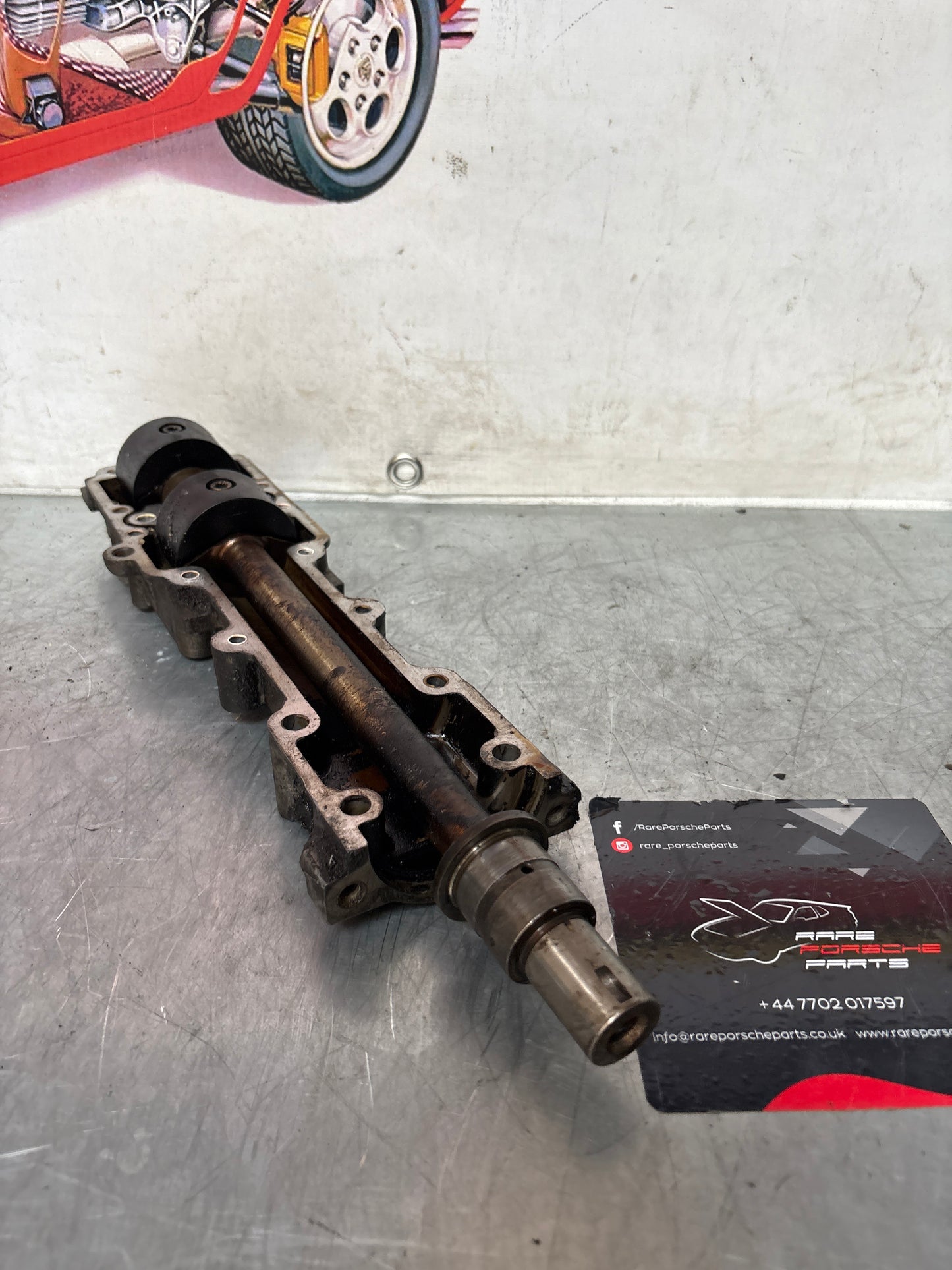 Porsche 924 2.5 / 944 Balance shaft, with housing, used 9441011080R