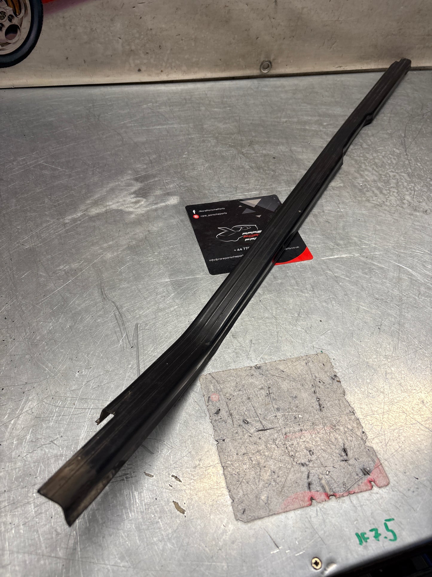 Porsche 944 85.5- left sill trim, scuff plate used 94455112100 cracked