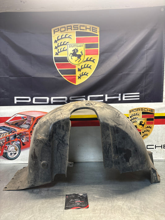 Porsche 944 from 85.5 wheel arch liner  Left, 94450438101 Used