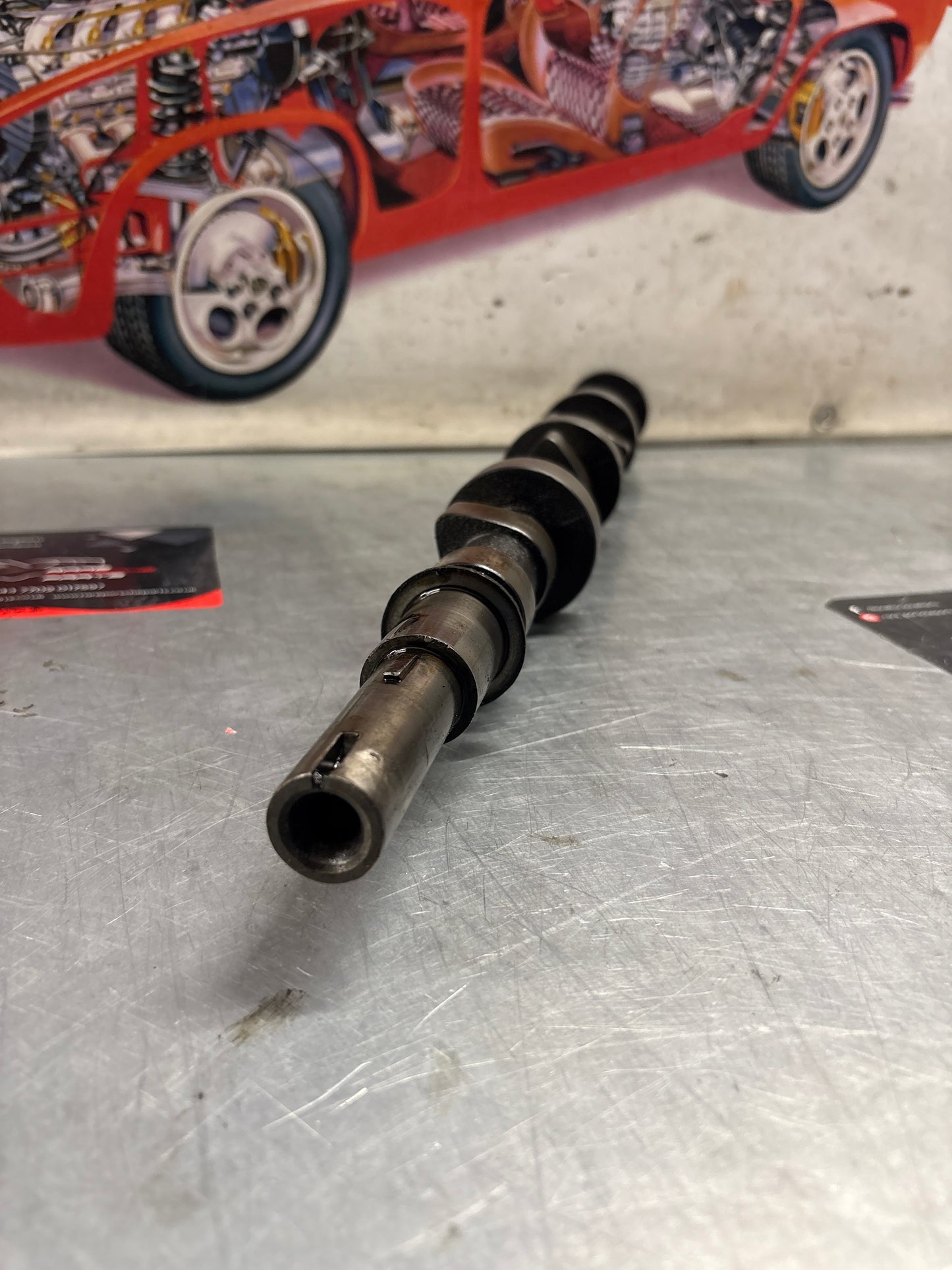 Porsche 928 cam shaft, used 9281051563R