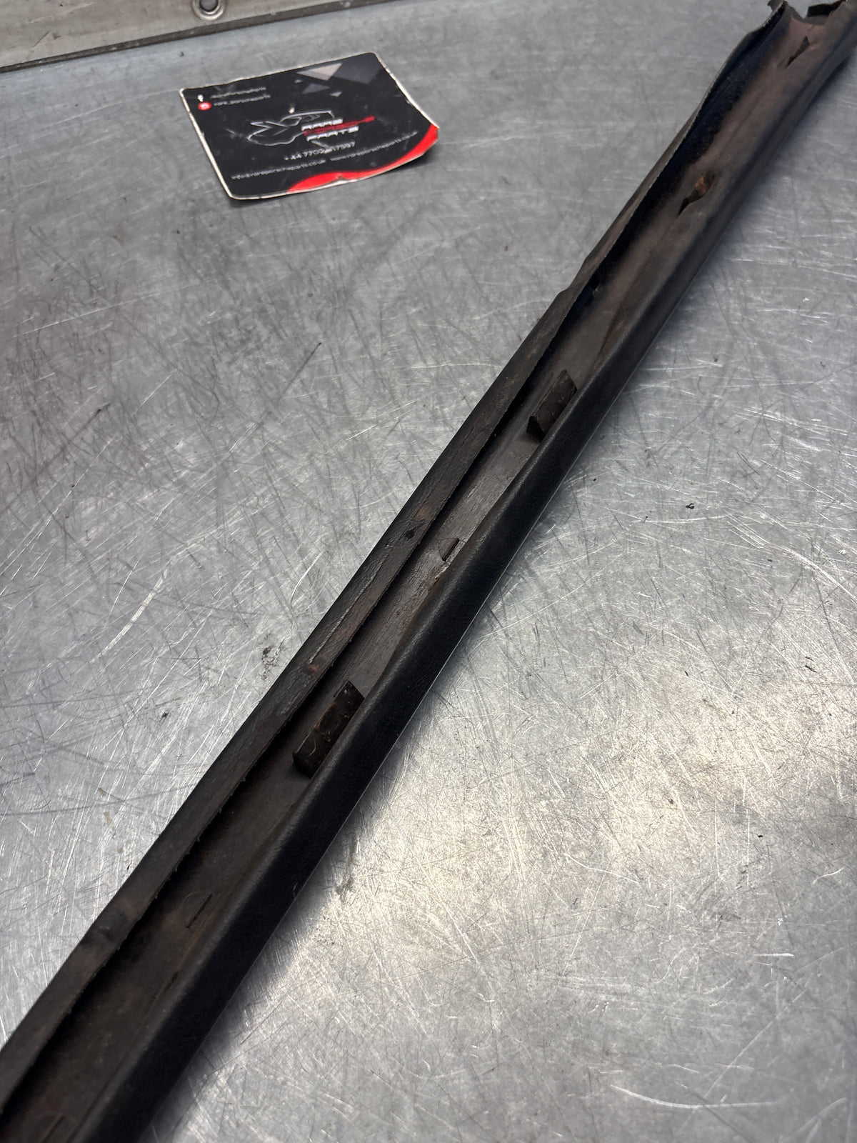 Porsche 928 tailgate trim, left, near side, black, 92855503702, used