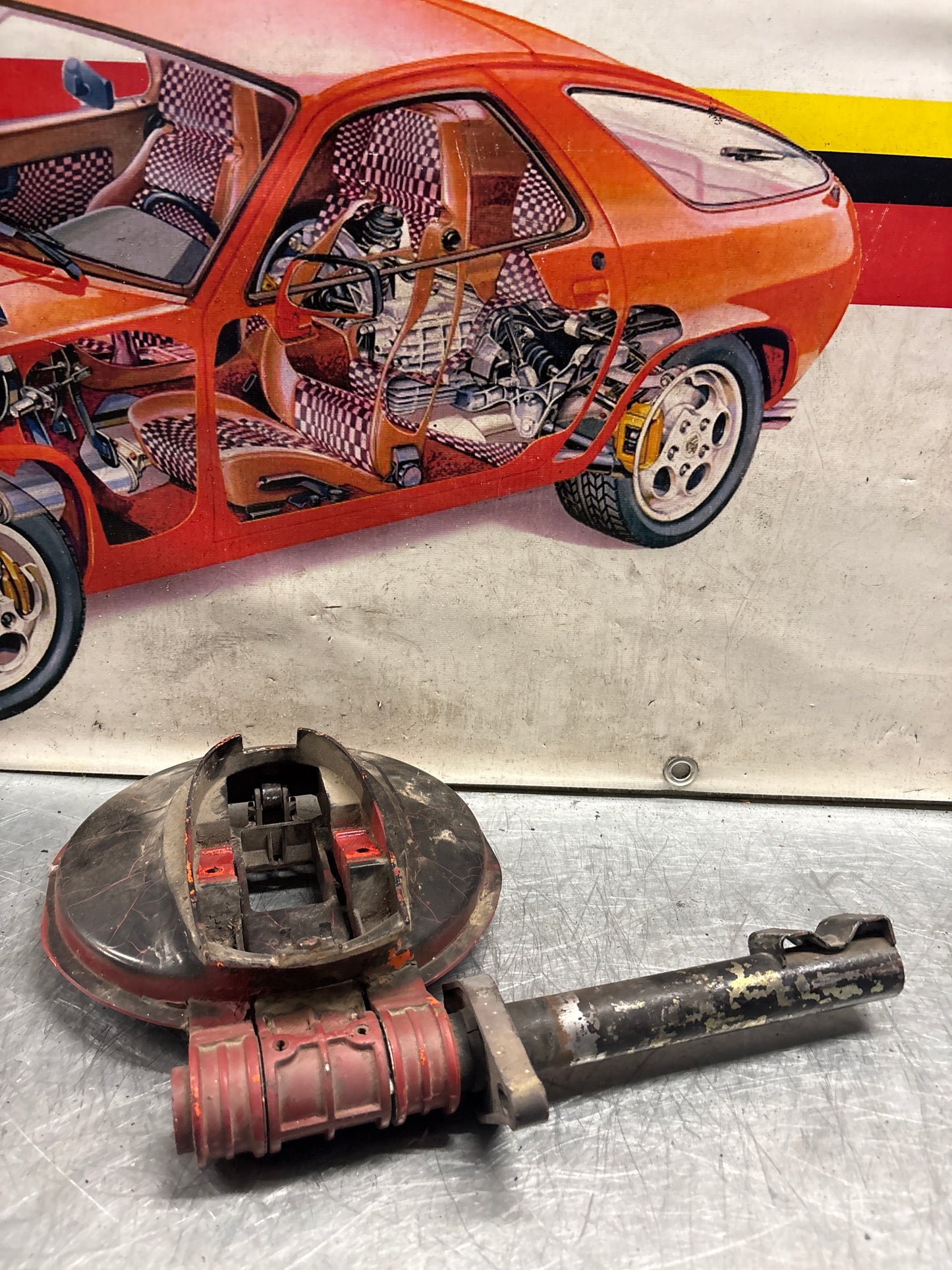 Porsche 928 left headlight swivel frame 92875024902 92875024302 used