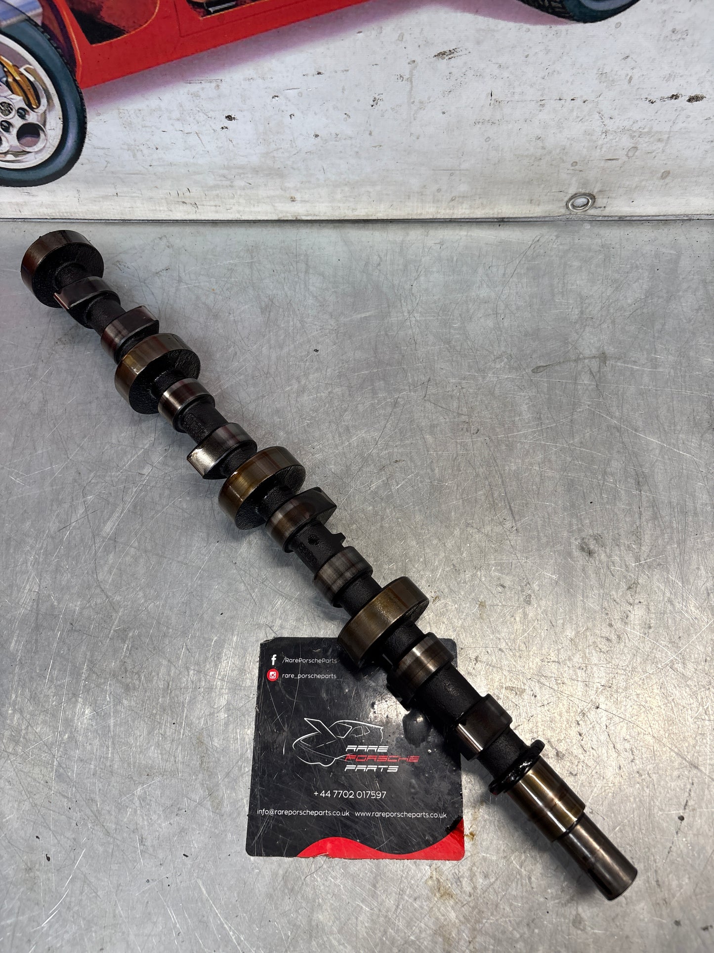 Porsche 928 cam shaft, used 9281052030R
