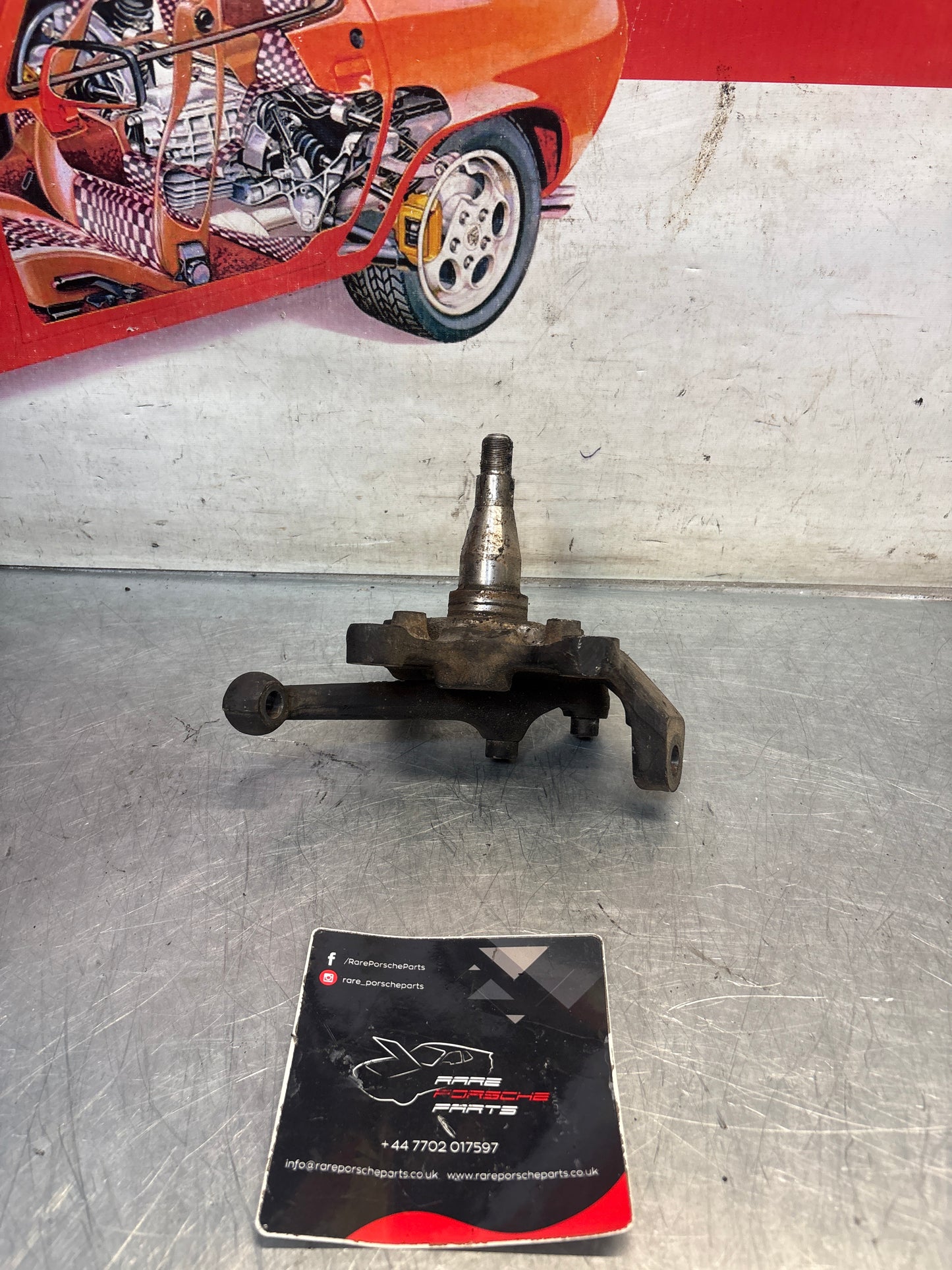 Porsche 928 left steering spindle knuckle, used 92834105713