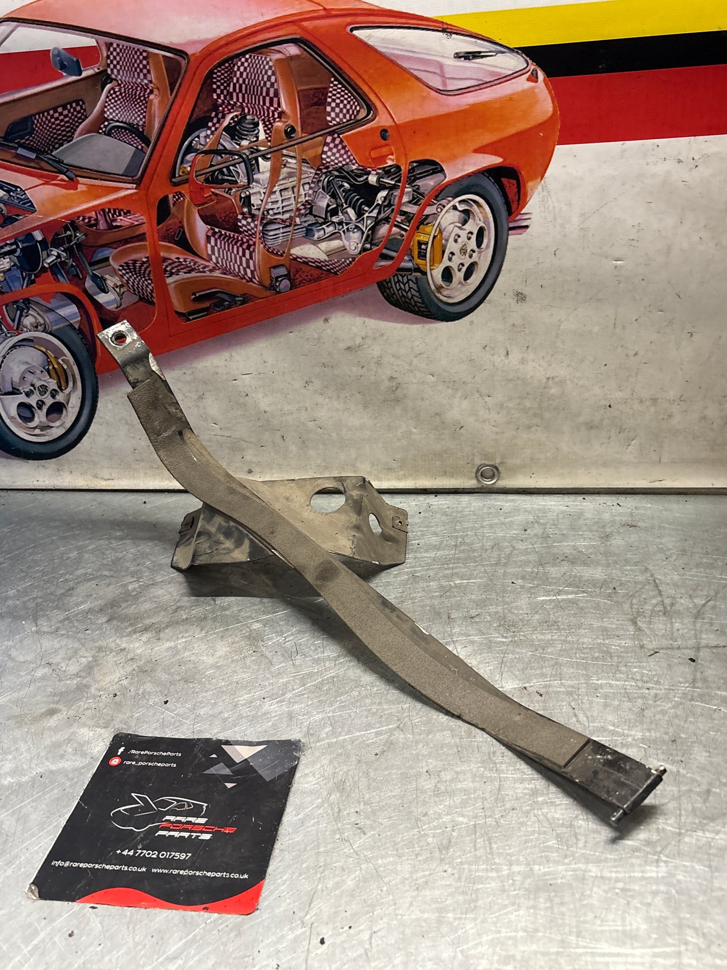 Porsche 944 S2 / Turbo 90- left fuel tank restraining strap, used 95120131502