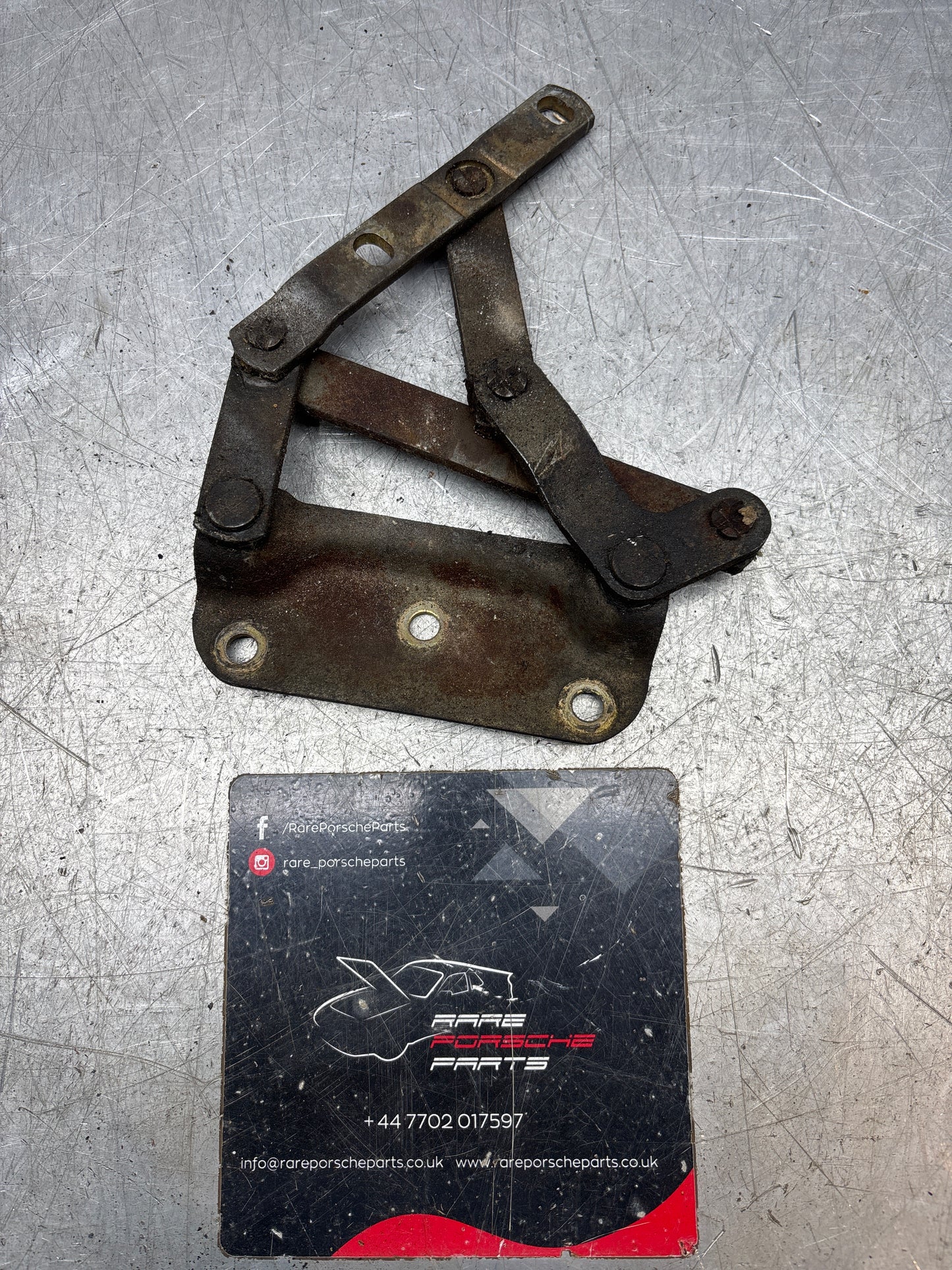 Porsche 928 left hand side bonnet hinge, used 92851104104
