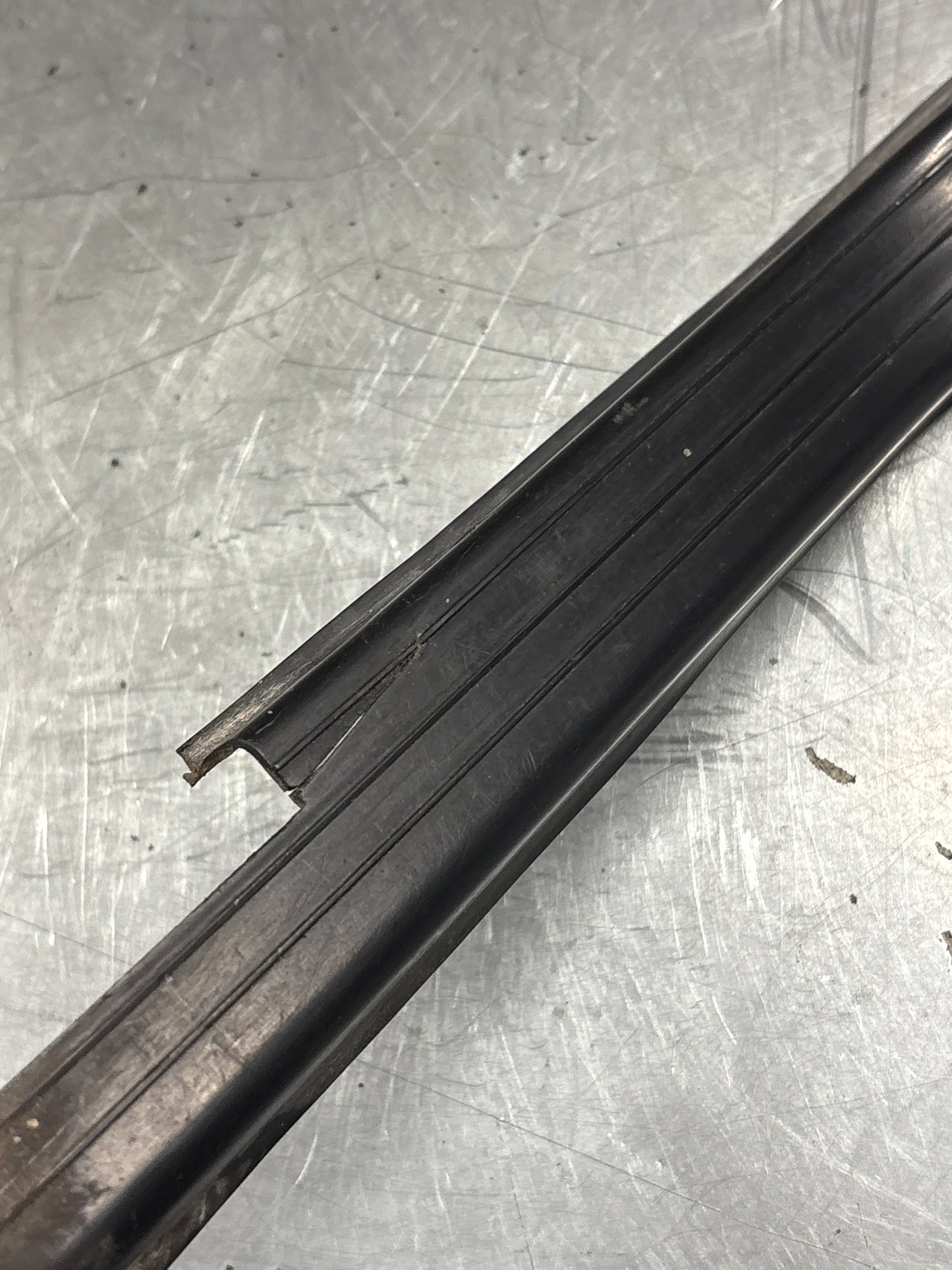 Porsche 944 85.5- left sill trim, scuff plate used 94455112100 cracked