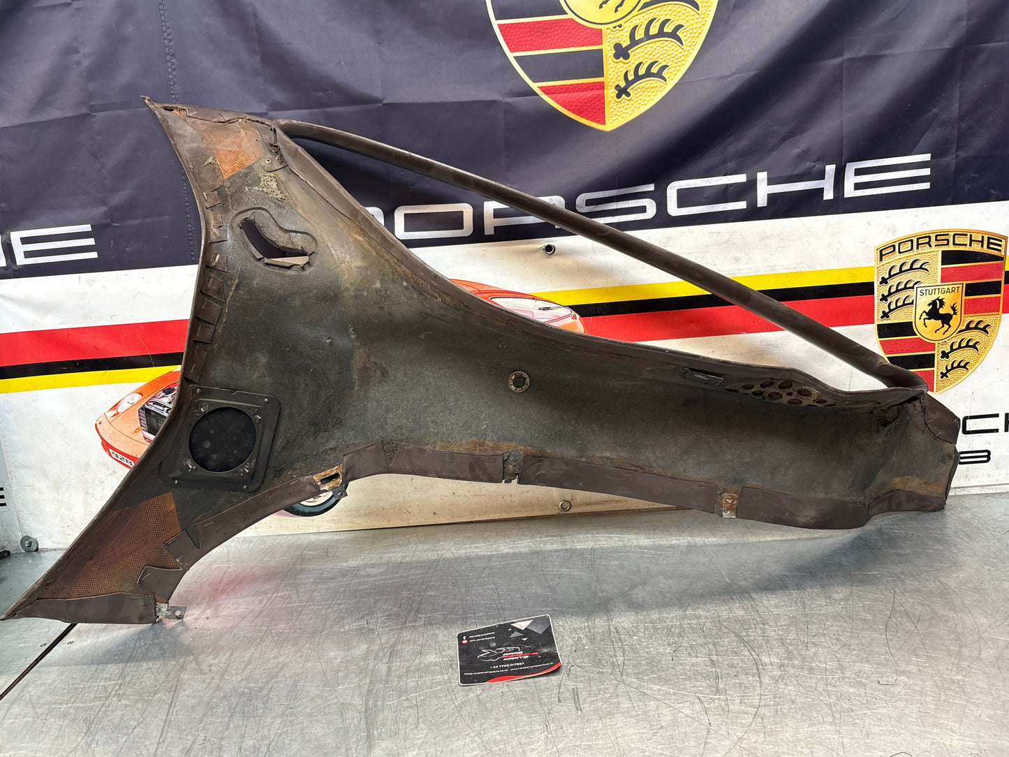 Porsche 928 early left side lower side trim panel, without loudspeaker, brown used 92855502102