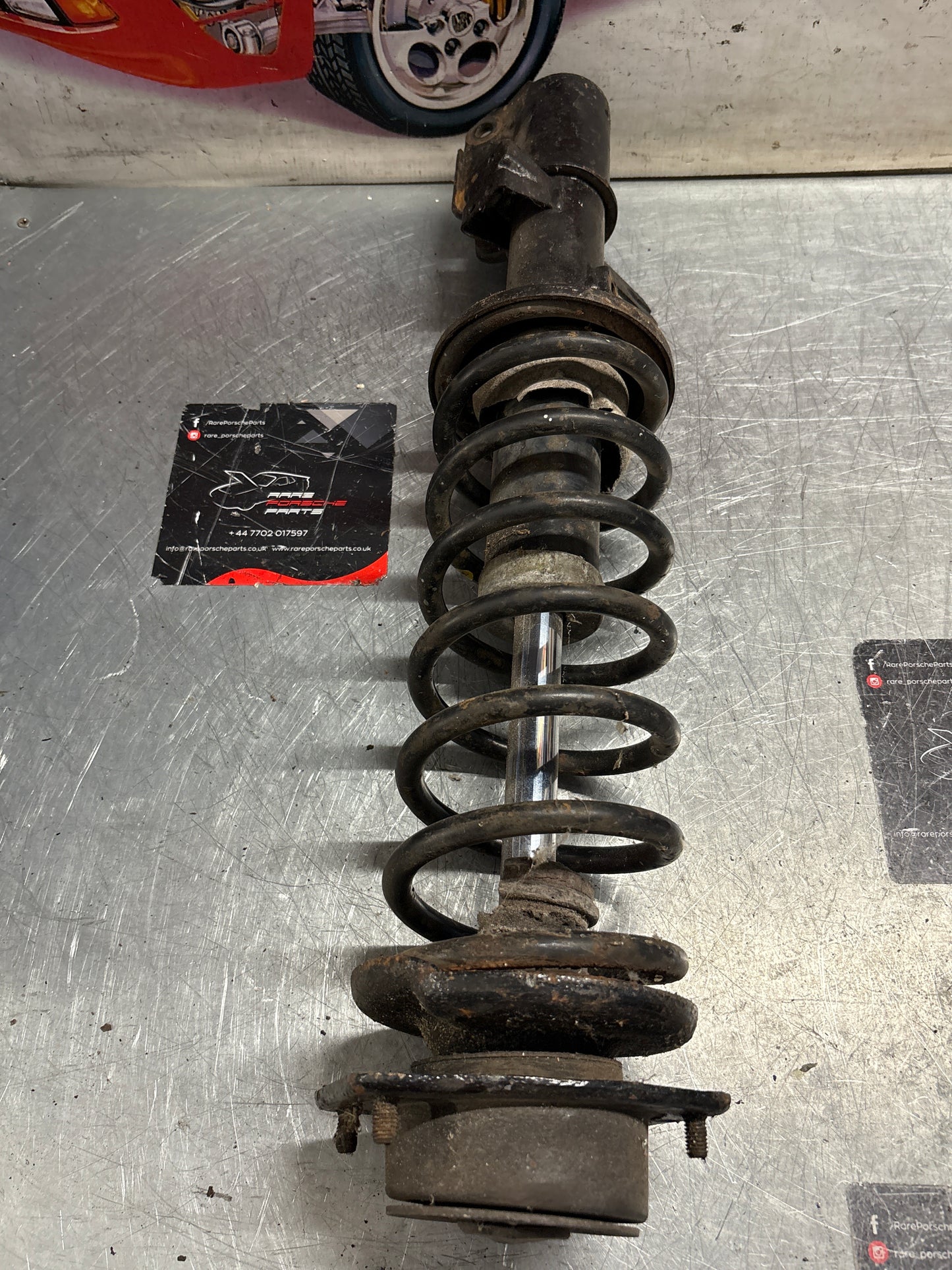 Porsche 944 Turbo front left shock absorber, used 95134303105