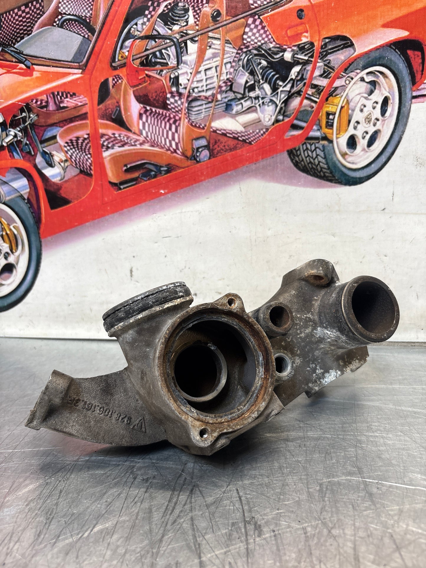 Porsche 928 thermostat housing, used 9281061613R