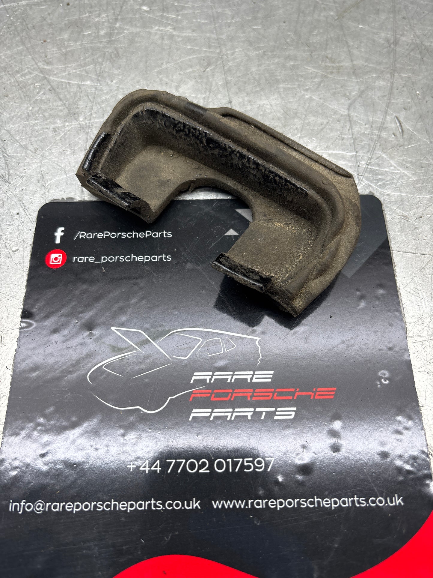 Porsche 944, S2/ 924S left tailgate latch pin gasket rubber, used 94451236501