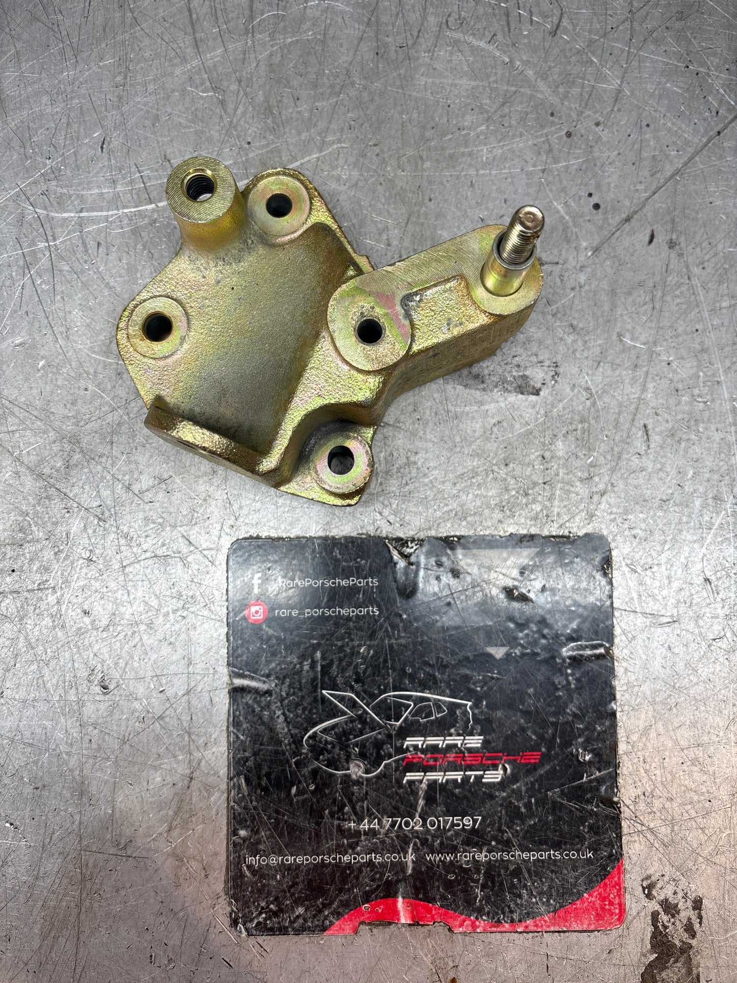 Porsche 924S / 944 belt tensioner  support bracket, used 9441051737R