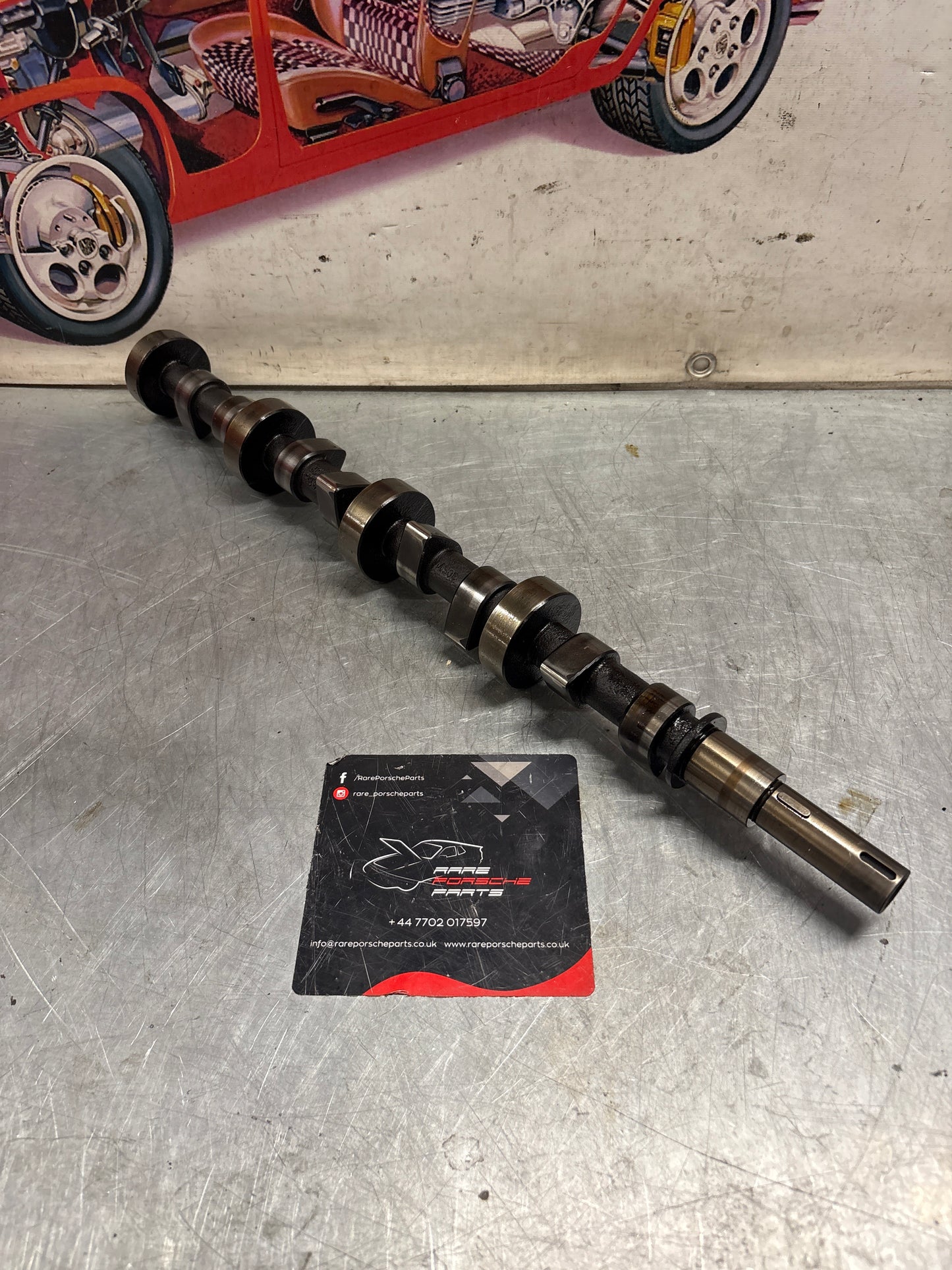 Porsche 928 cam shaft, used 9281052040R