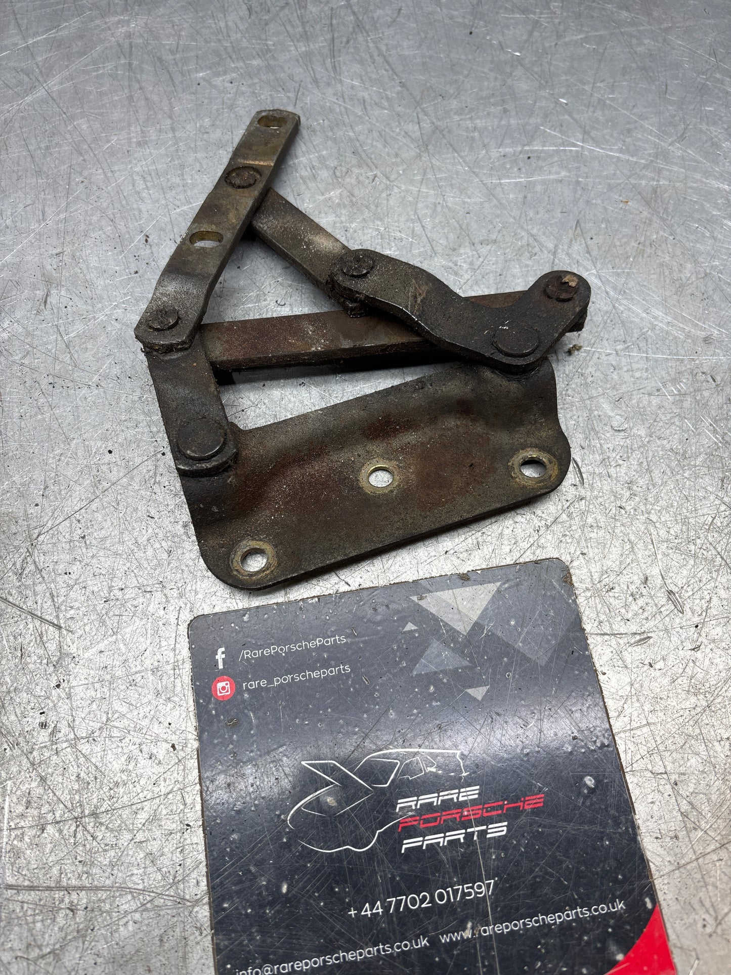 Porsche 928 left hand side bonnet hinge, used 92851104104