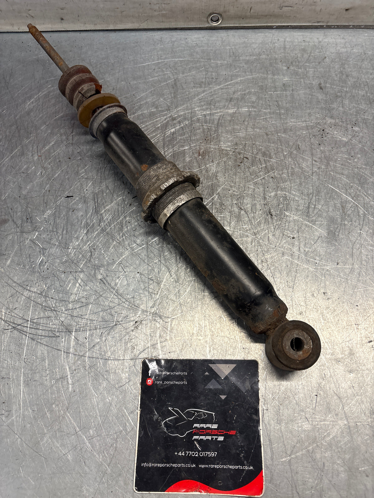 Porsche 911 964 rear shock absorber, used 96433305700