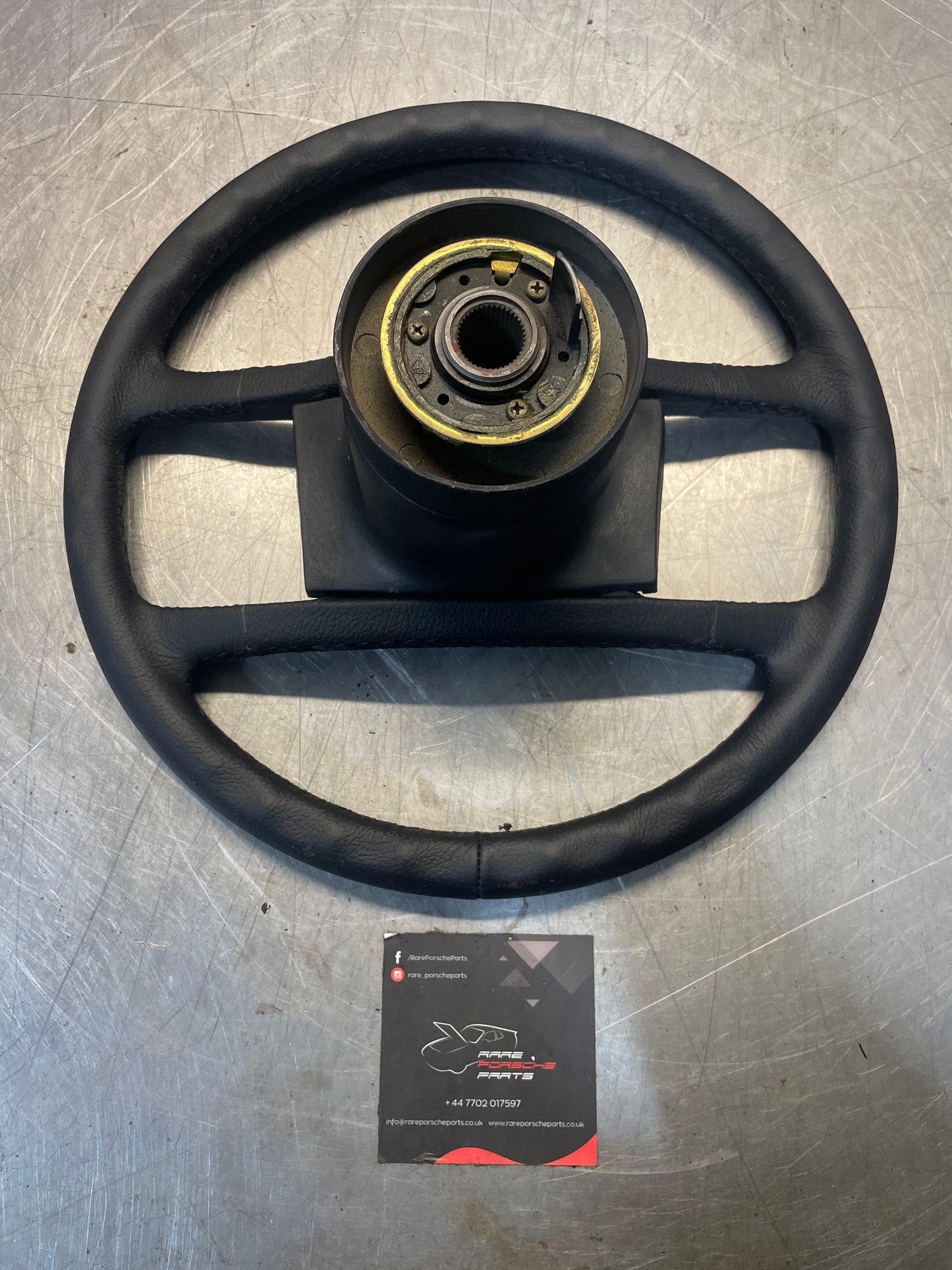 Porsche 911 930 black leather steering wheel, refurbished 91134708408