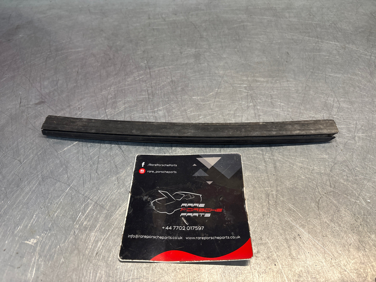 Porsche 924 early lower inner seal, used 477837479A