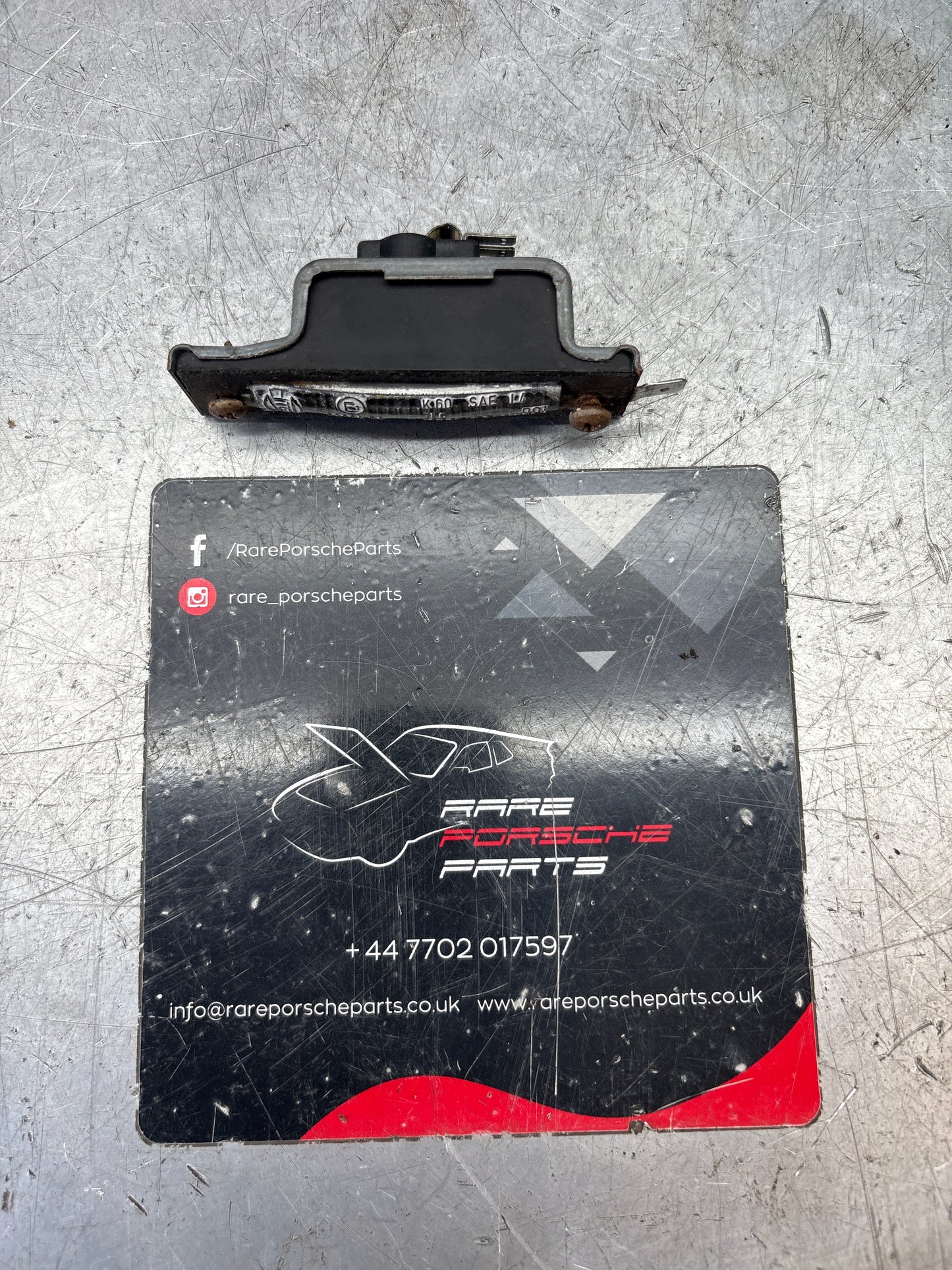 Porsche 924 / 944 rear number plate light housing 477943021A