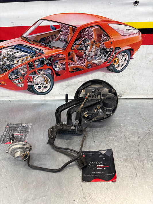 Porsche 968 right headlight swivel frame, used 94475057200 / 94475057400 / 94475037800