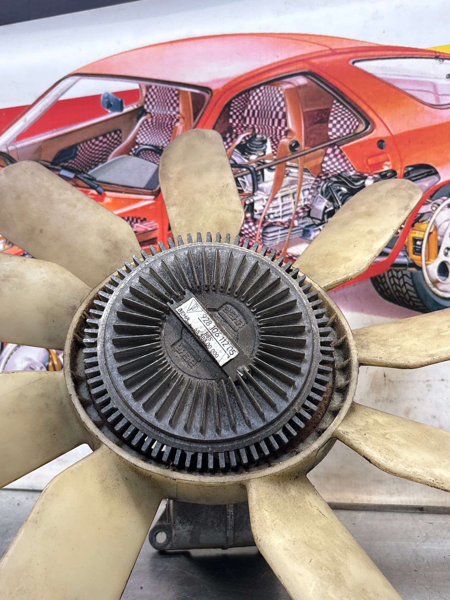 Porsche 928 late engine cooling fan clutch with bracket, used 92810611205 / 92810613701 / 9281061104R