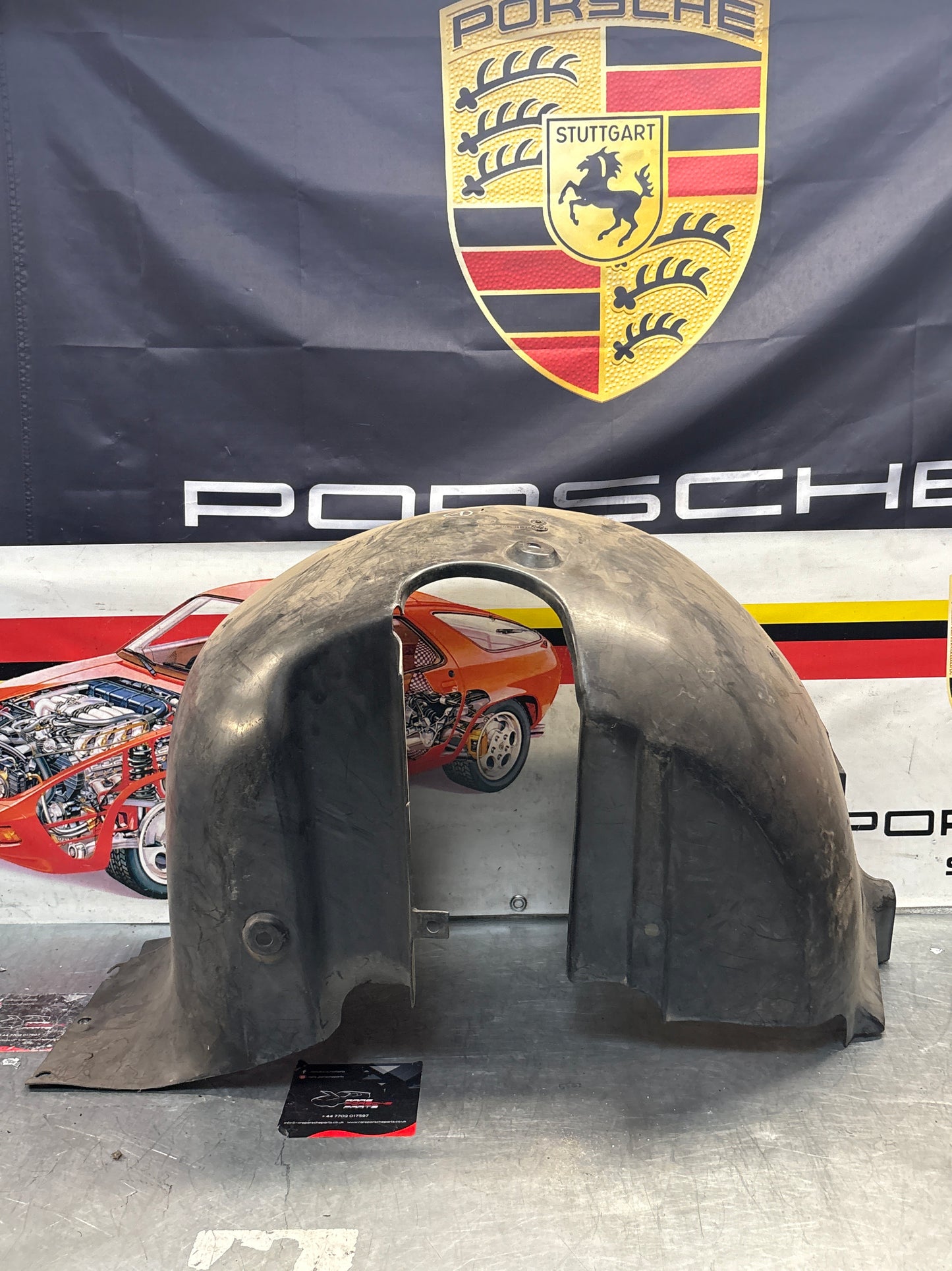 Porsche 944 from 85.5 wheel arch liner  Left, 94450438101 Used