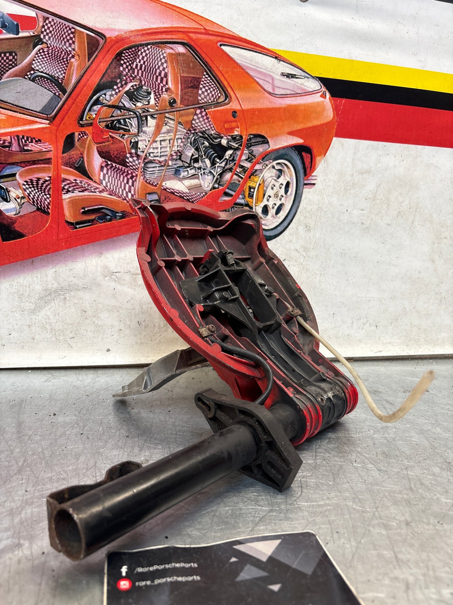 Porsche 928 left headlight swivel frame 92875024902 92875024302 used