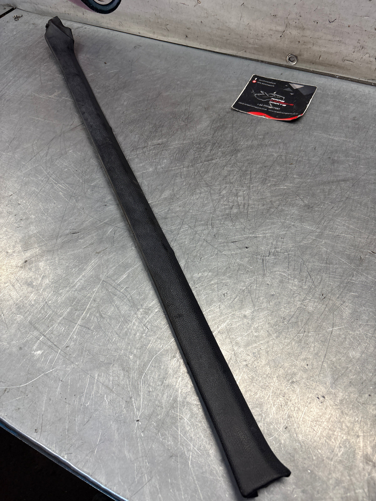 Porsche 928 tailgate trim, left, near side, black, 92855503702, used