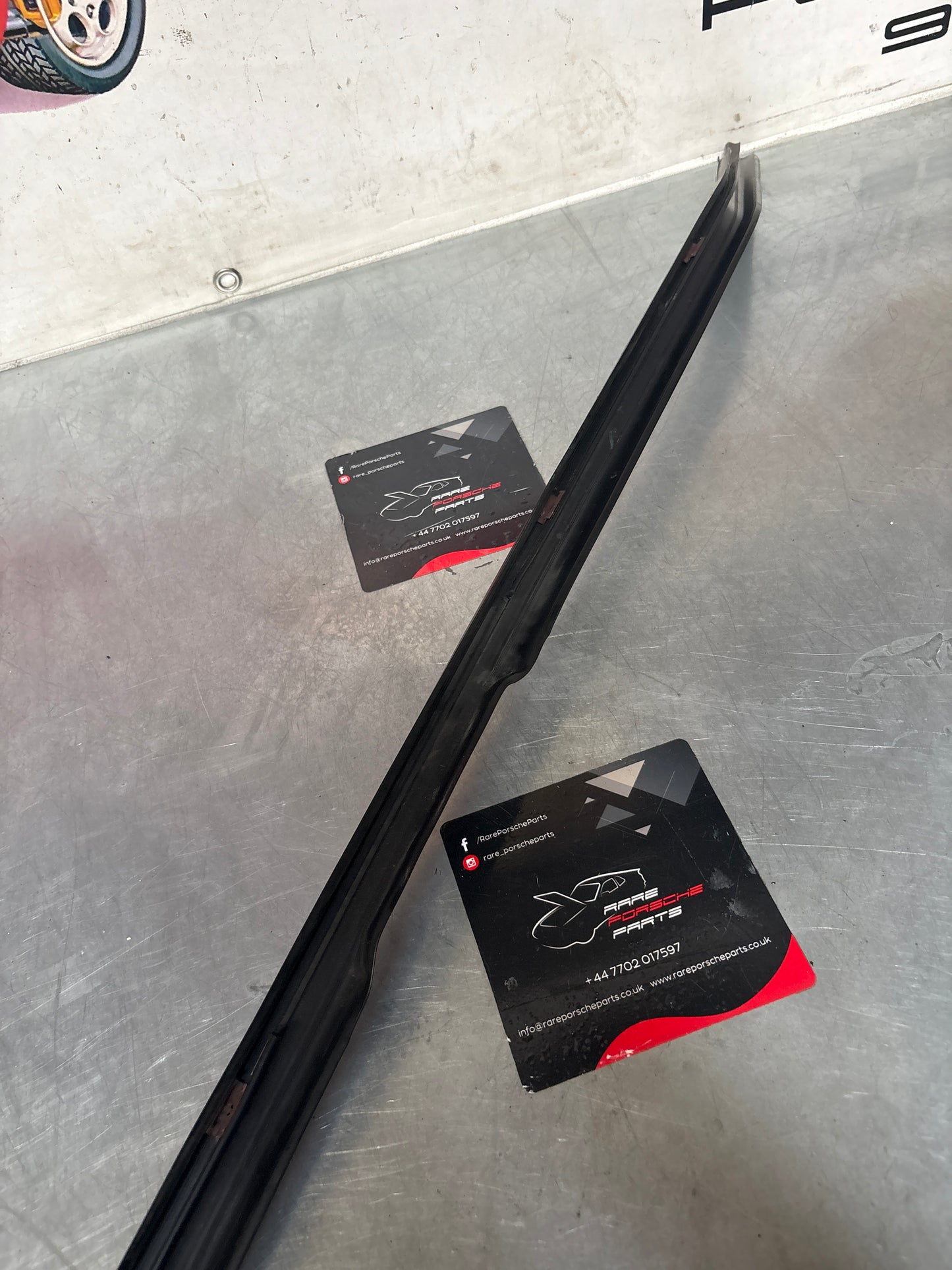 Porsche 944 85.5- left sill trim, scuff plate used 94455112100 cracked