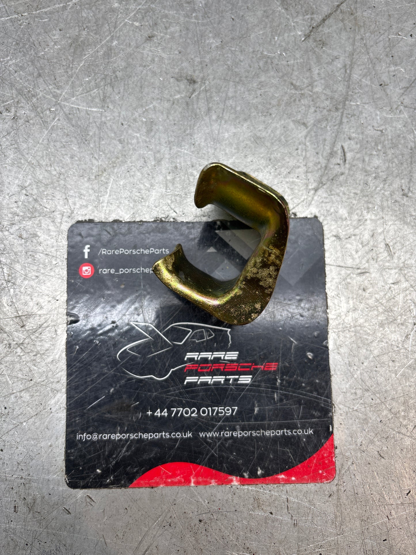 Porsche 928 exhaust hook, bracket, refurbished 92811127800