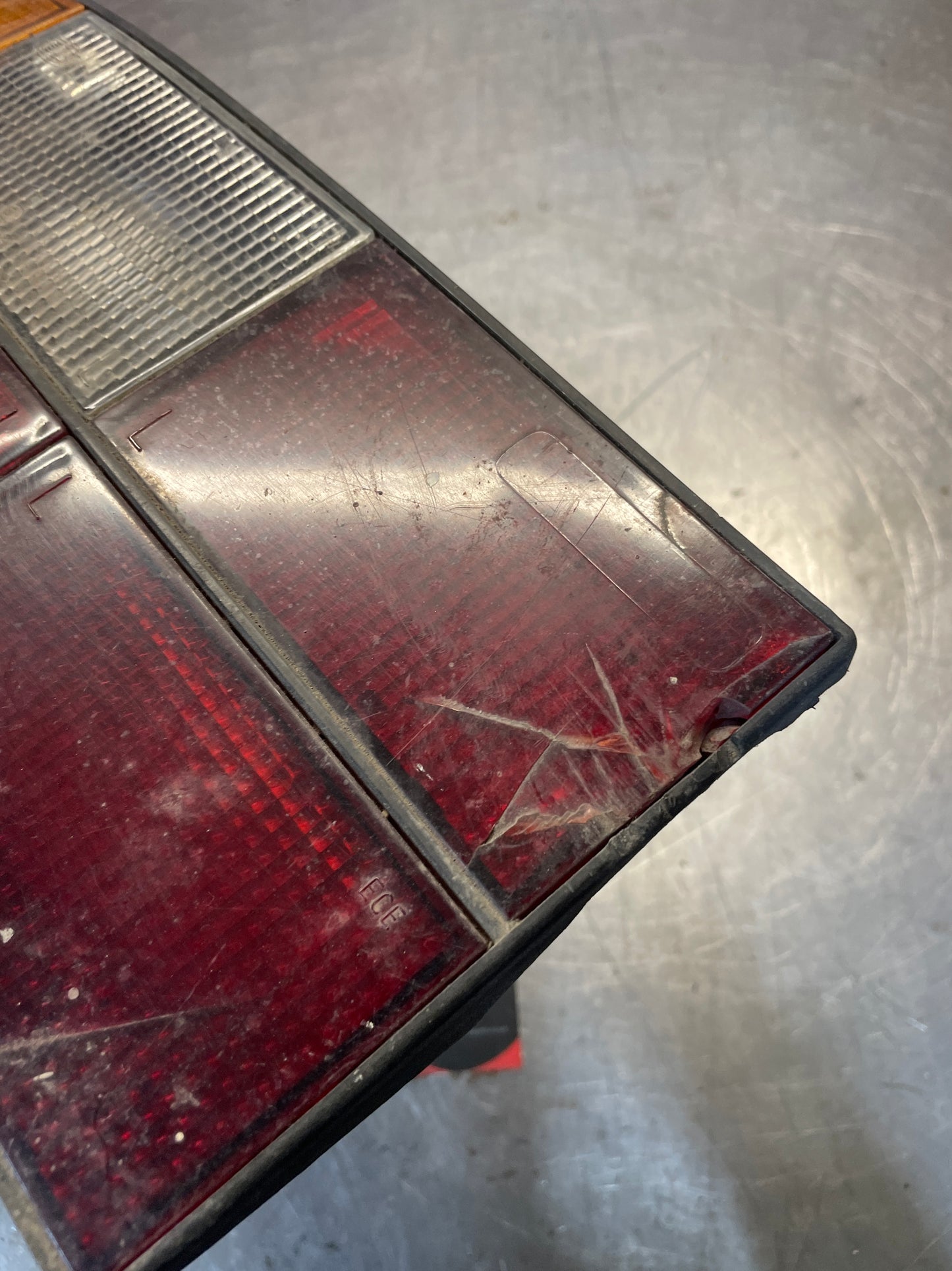 Porsche 924 / 944 left tail light, used, cracked