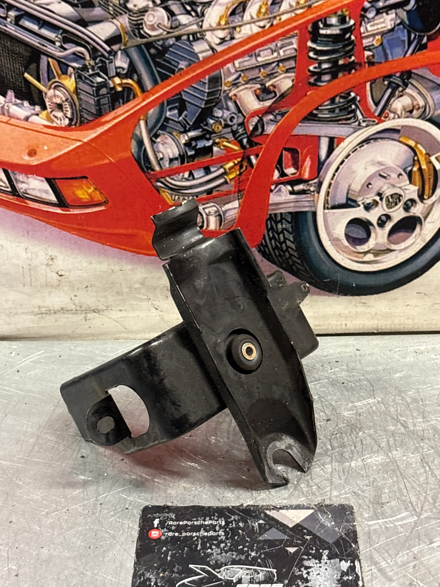 Porsche 928 ABS pump bracket, used 92835504104