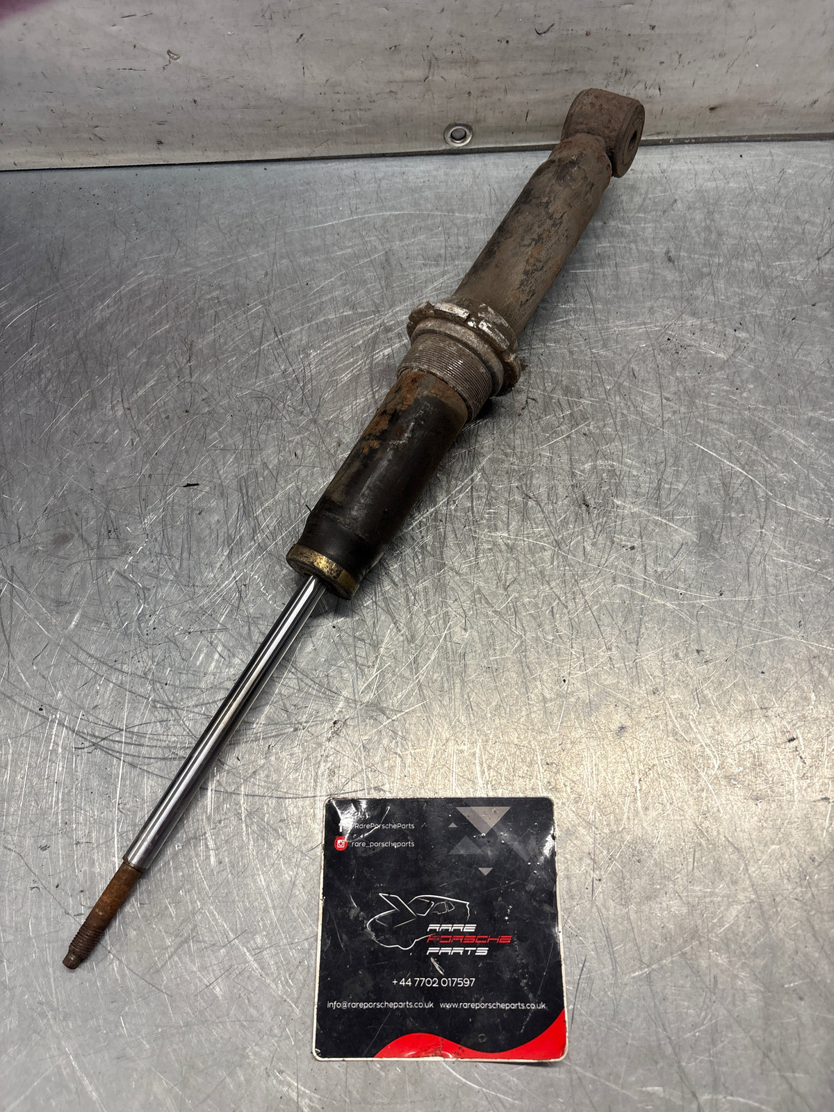 Porsche 911 964 rear shock absorber, used 96433305700
