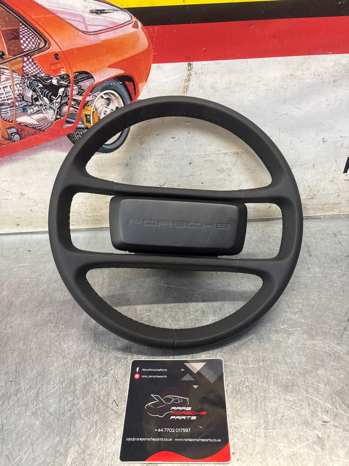 Porsche 928 steering wheel 92834708402, refurbished