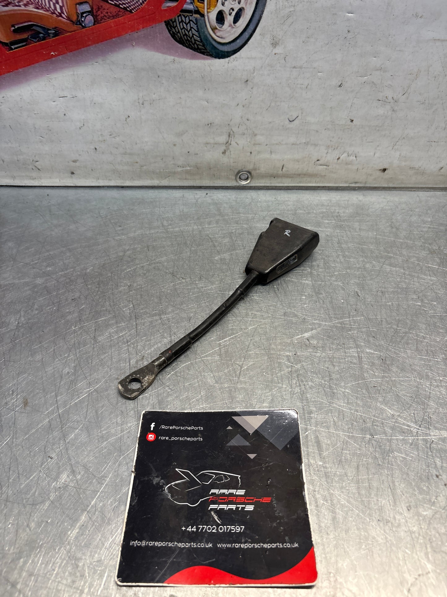 Used Porsche 924 early right seat belt anchor clasp retainer, buckle. 477857756D used