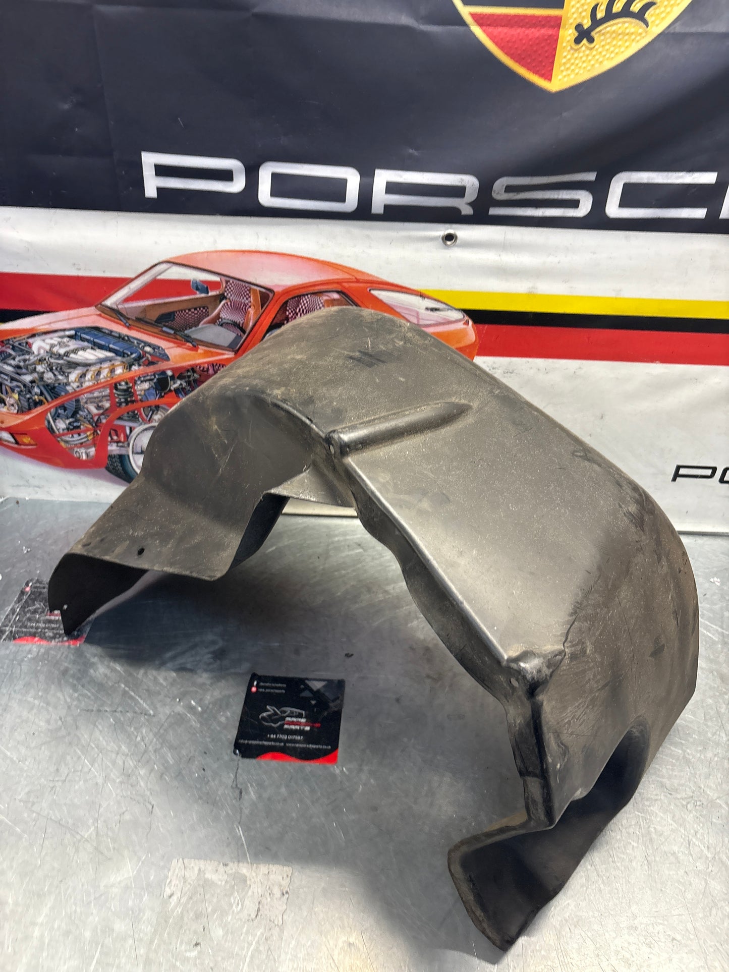 Porsche 928 wheel arch liner  Left 92850438105 Used