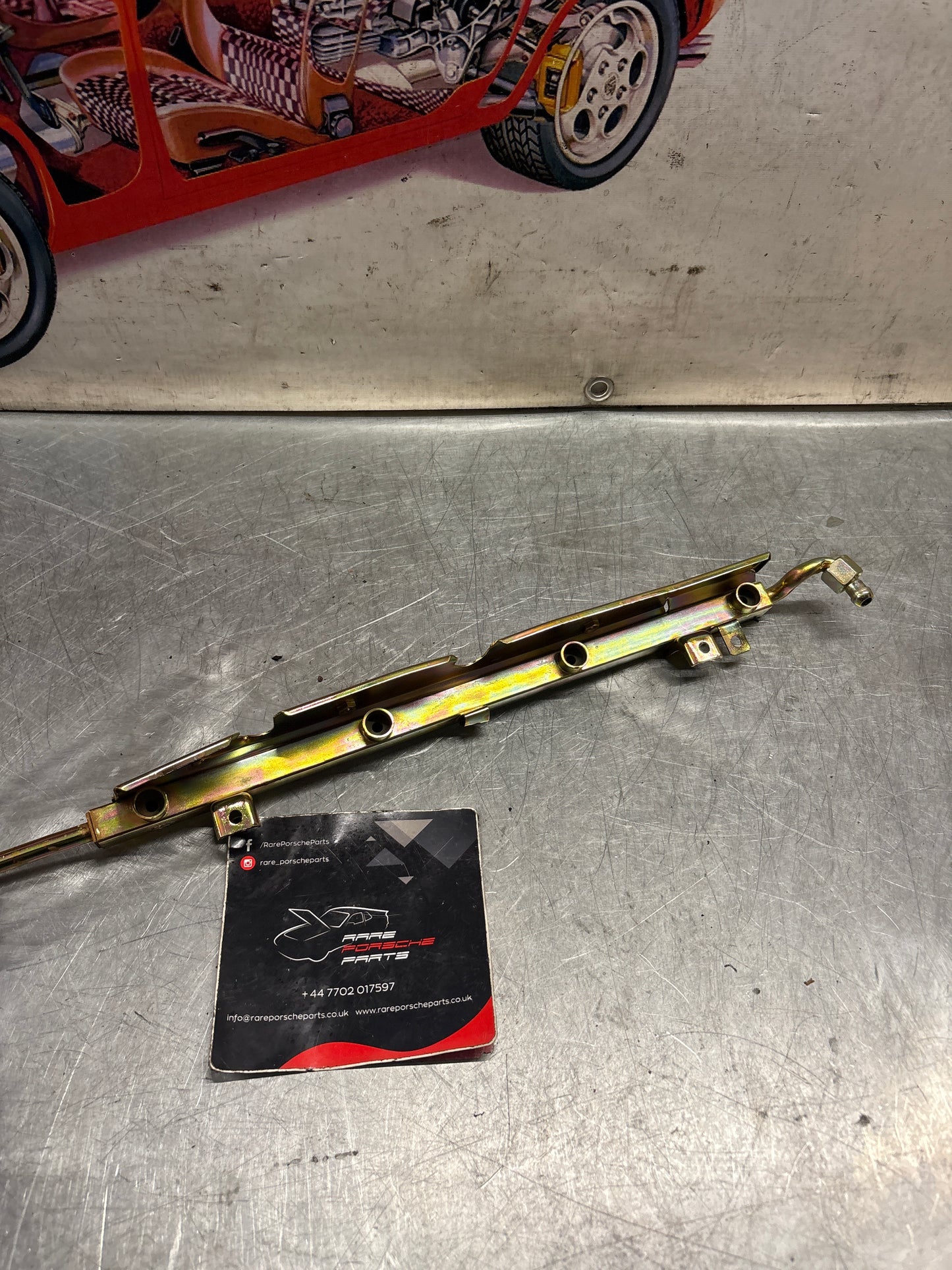 Porsche 928 S fuel rail, left, refurbished 92811007911