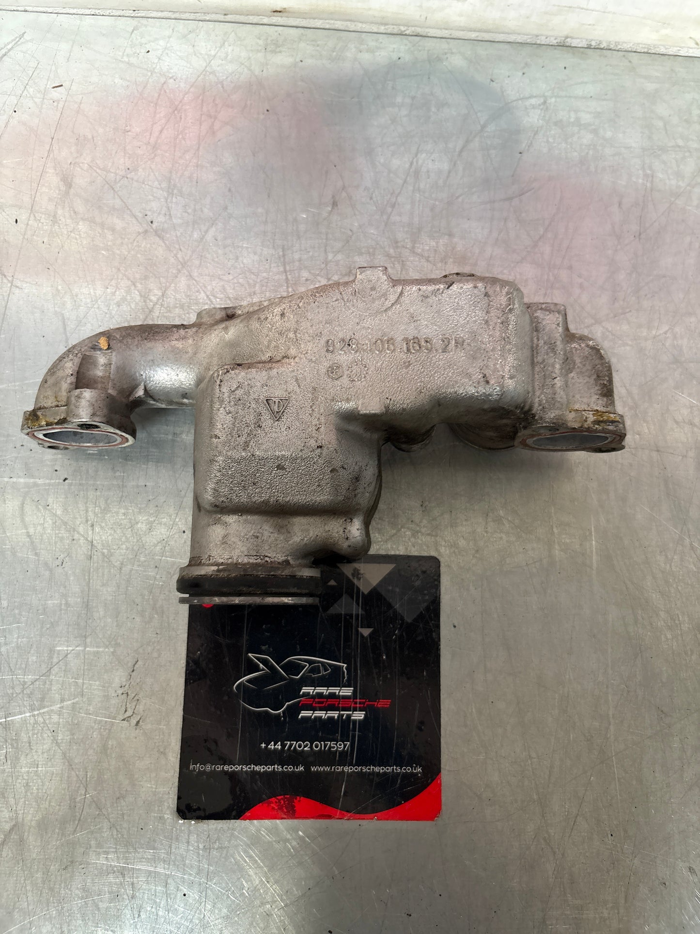 Porsche 928 thermostat housing, used 9281061652R