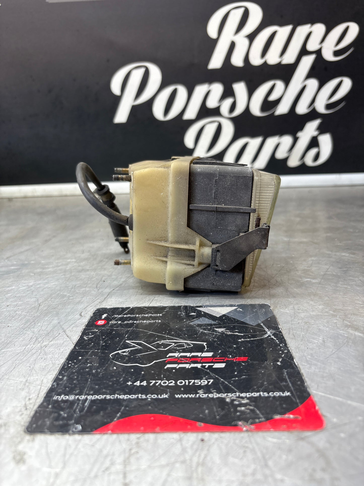 Porsche 928 Bosch headlight high beam, left 0306403001 / 92863141401