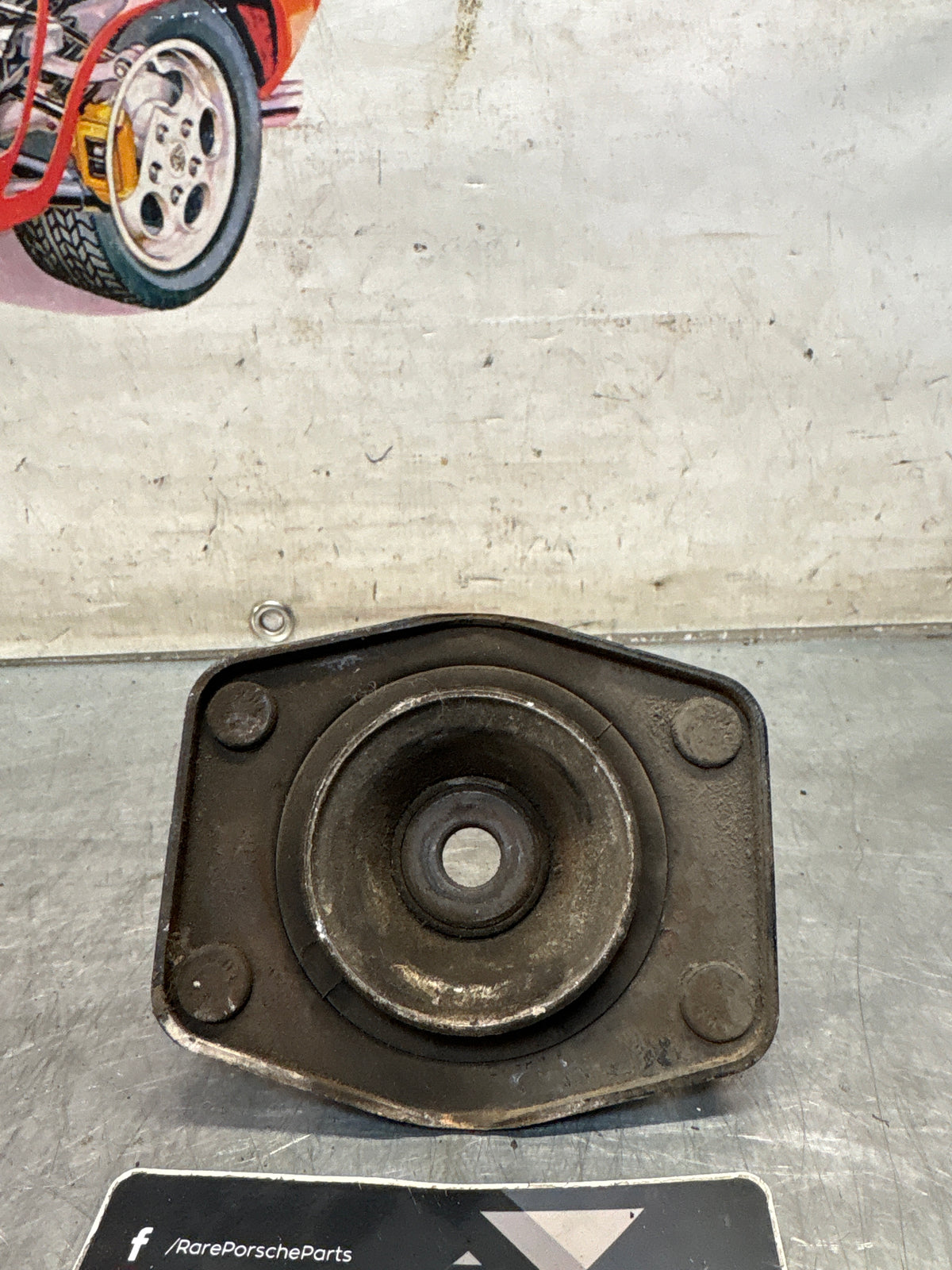 Porsche 924 / 944 front suspension bearing flange, 477412345, used