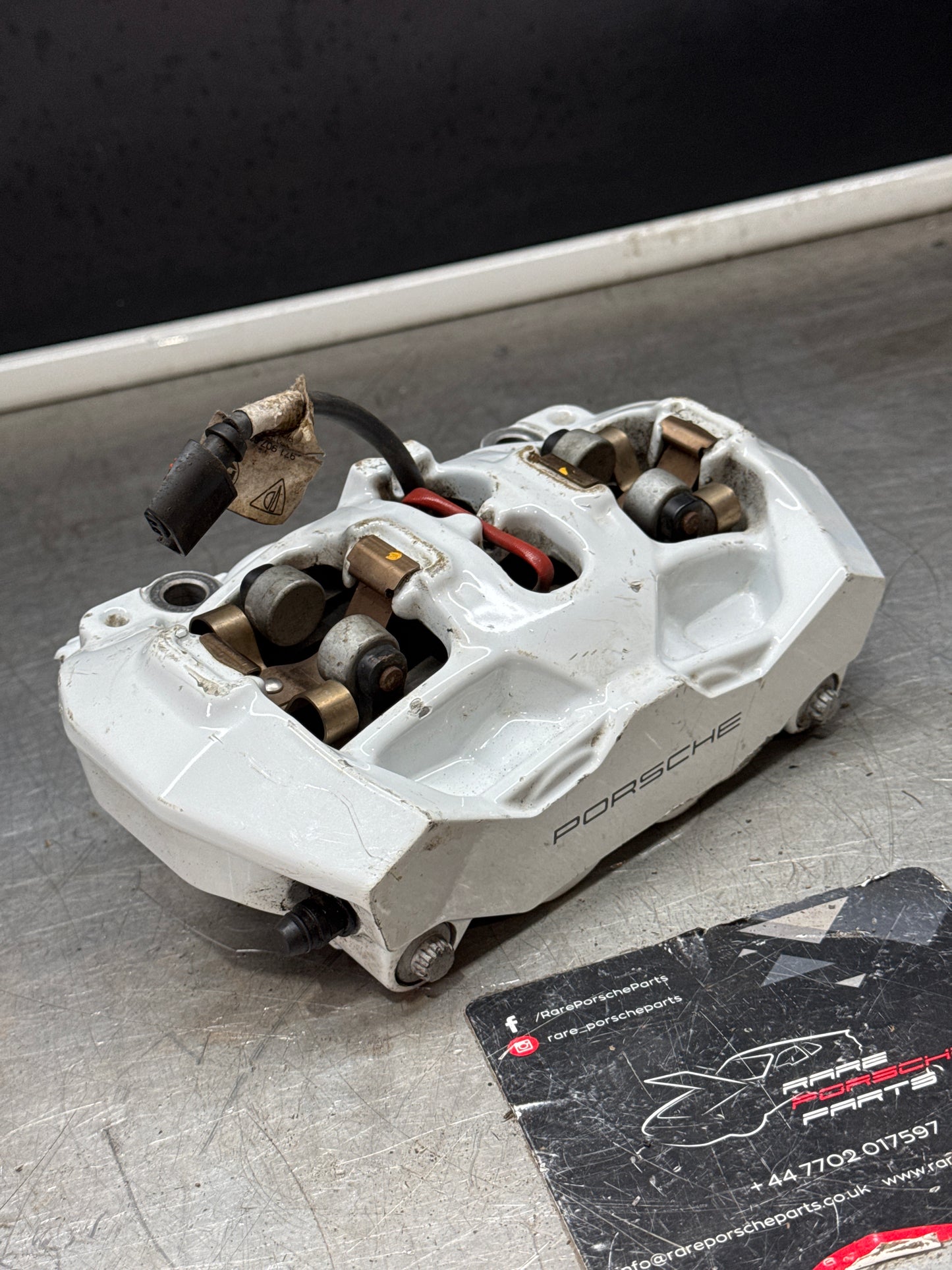 Porsche Brembo 4 Pot Rear Brake Caliper for Taycan 9J1615423. Used