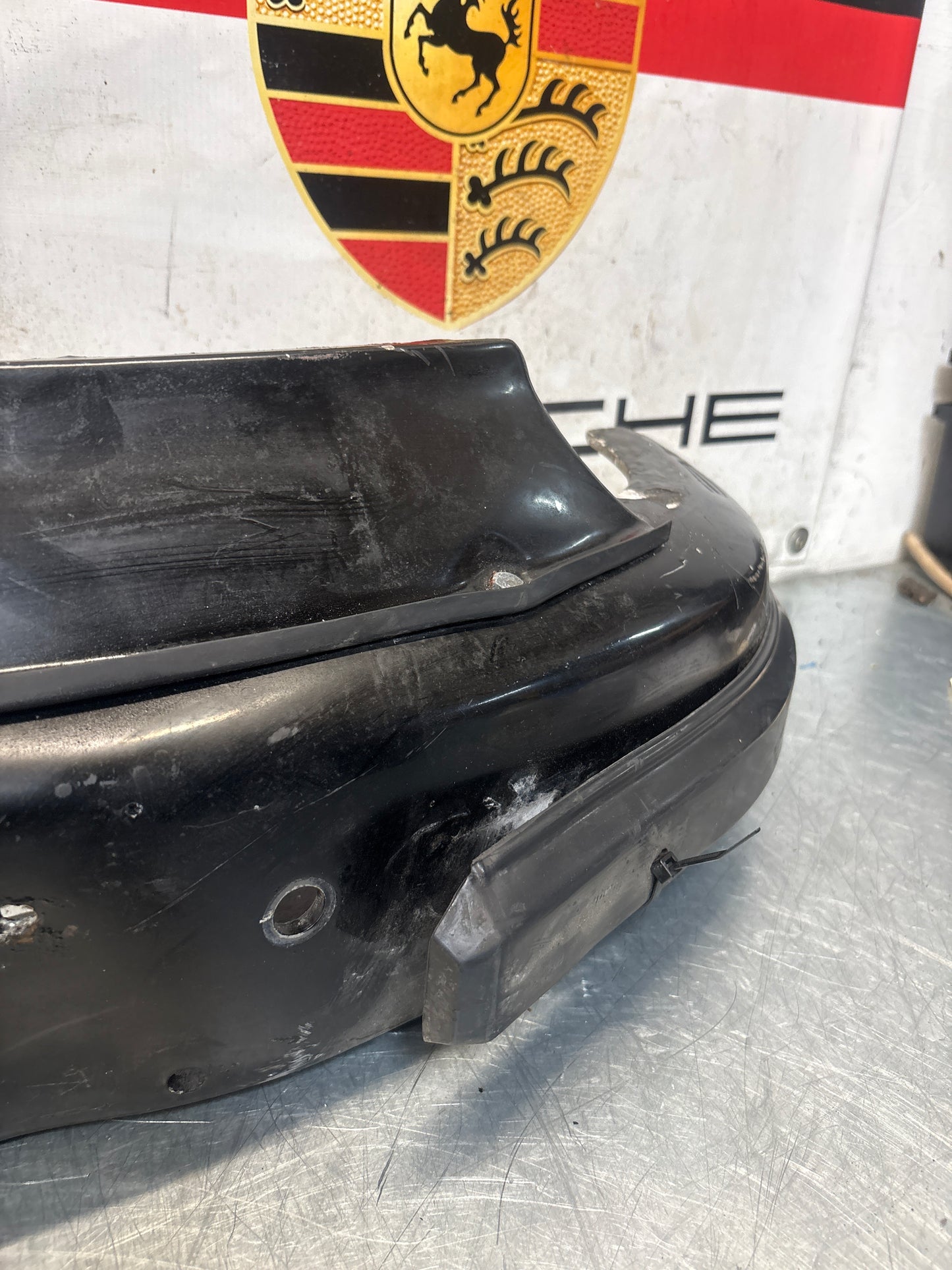 Porsche 911 930 rear bumper with skirt, used 93050511201