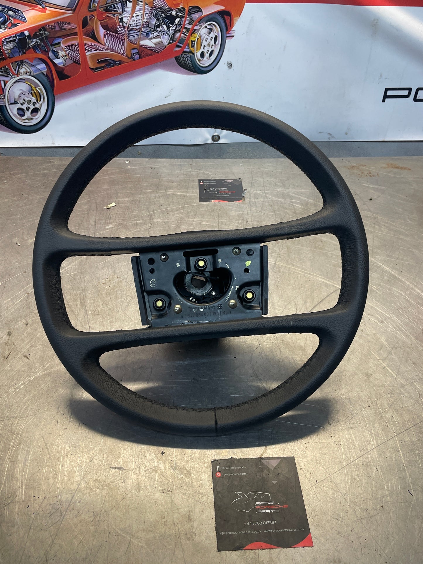 Porsche 911 930 black leather steering wheel, refurbished 91134708408