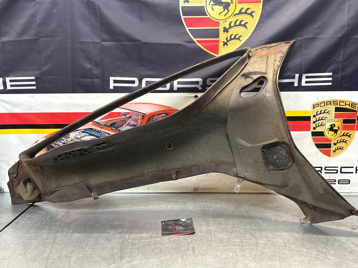 Porsche 928 early right side lower side trim panel, without loudspeaker, brown used 92855502202