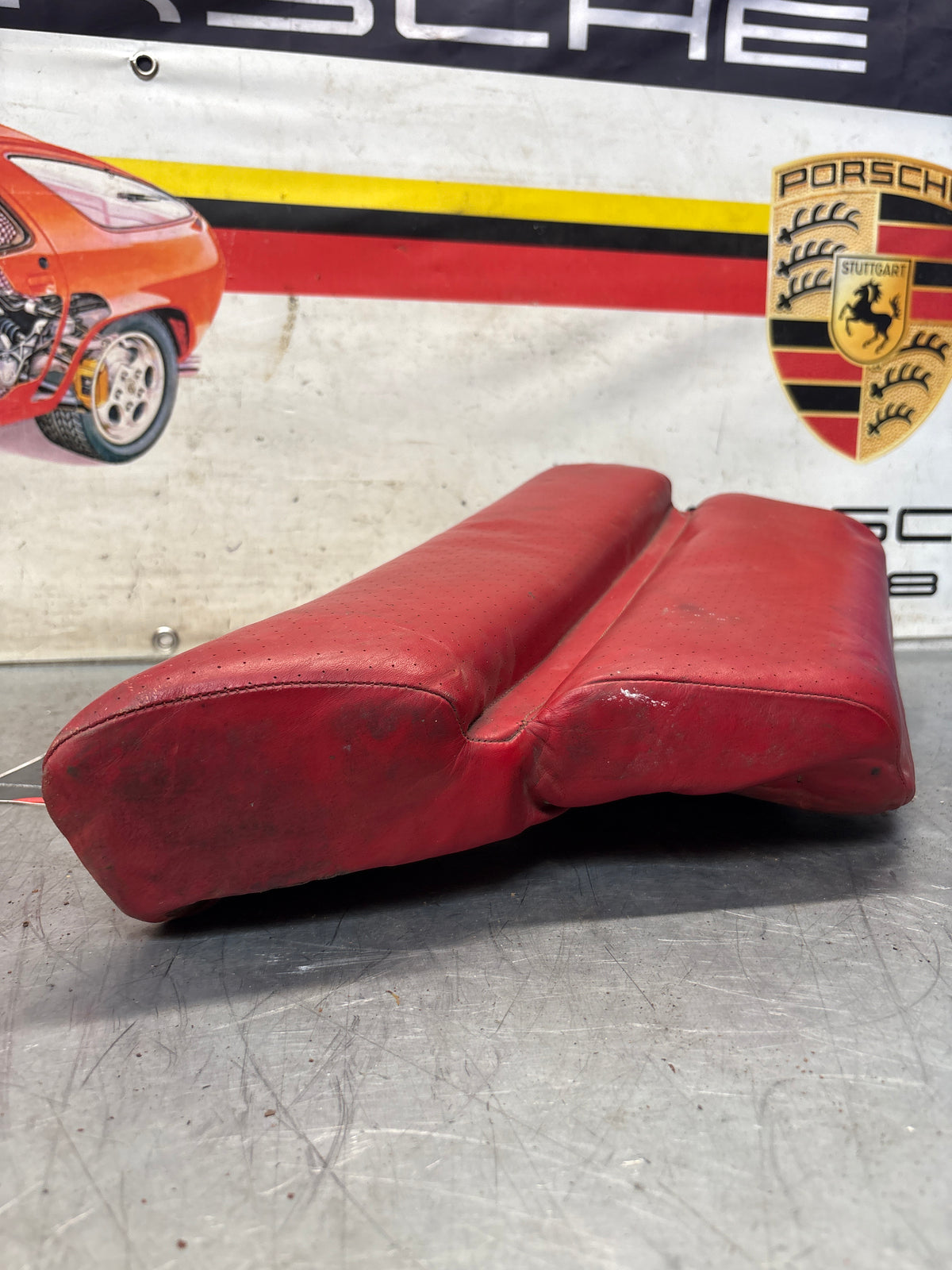 Porsche 928 rear left seat cushion, can-can red , leather, used 92852205951