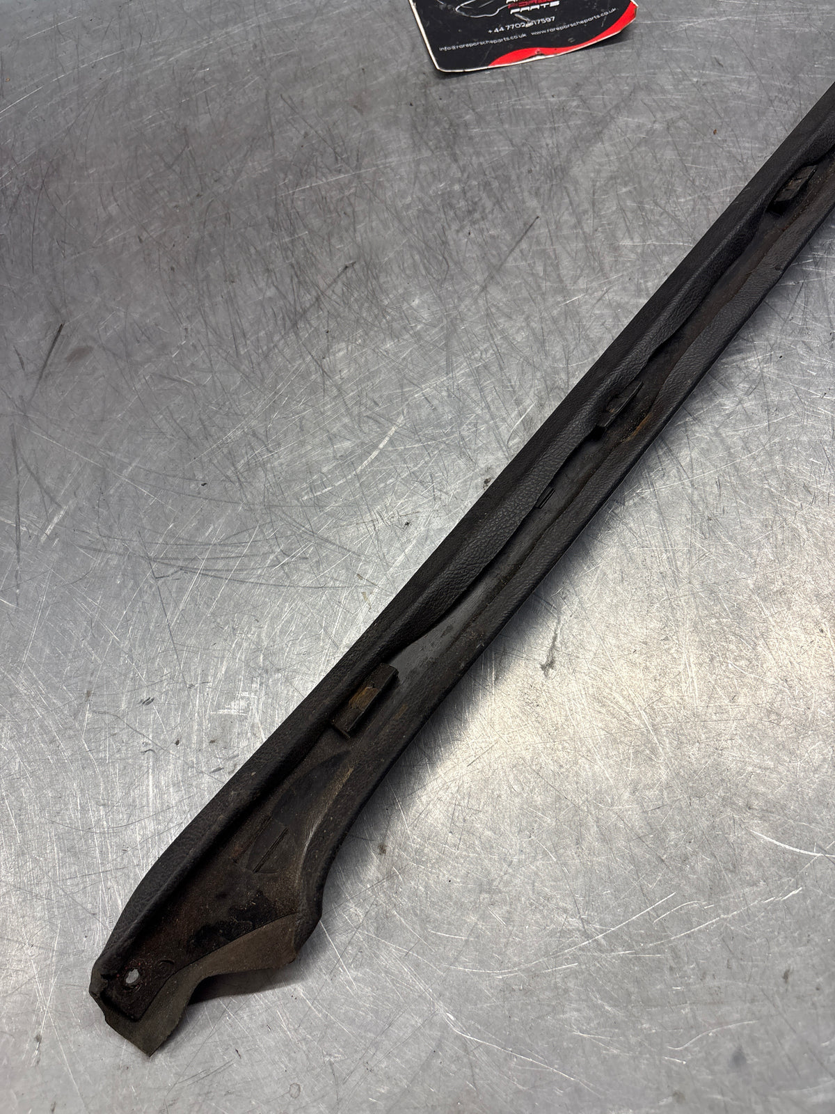 Porsche 928 tailgate trim, left, near side, black, 92855503702, used