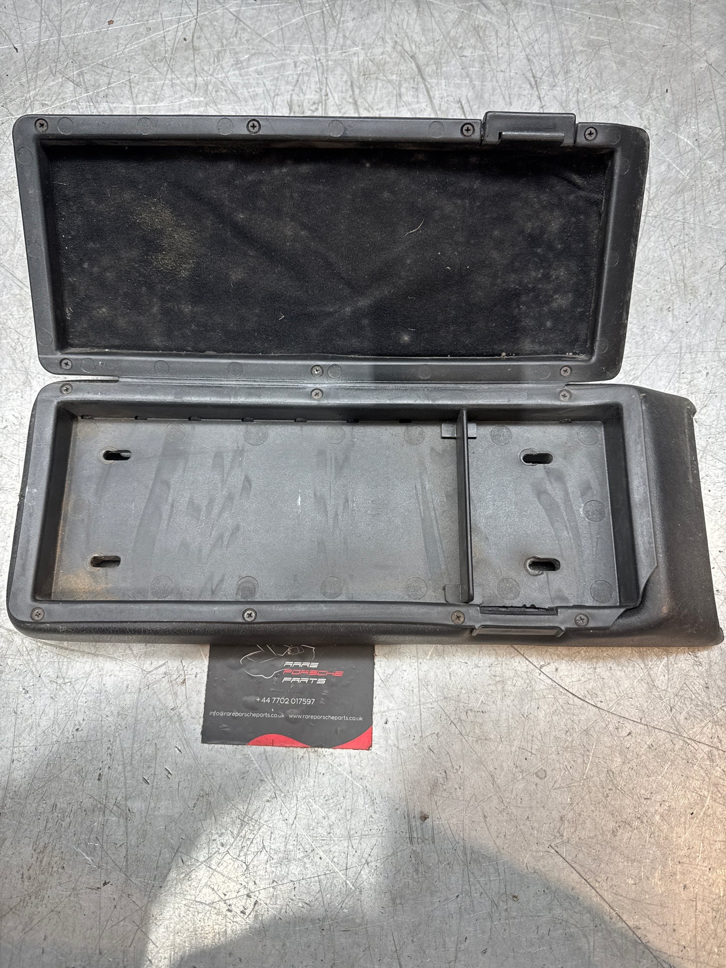 Porsche 928 92755572903 Central armrest cassette compartment black, used RHD